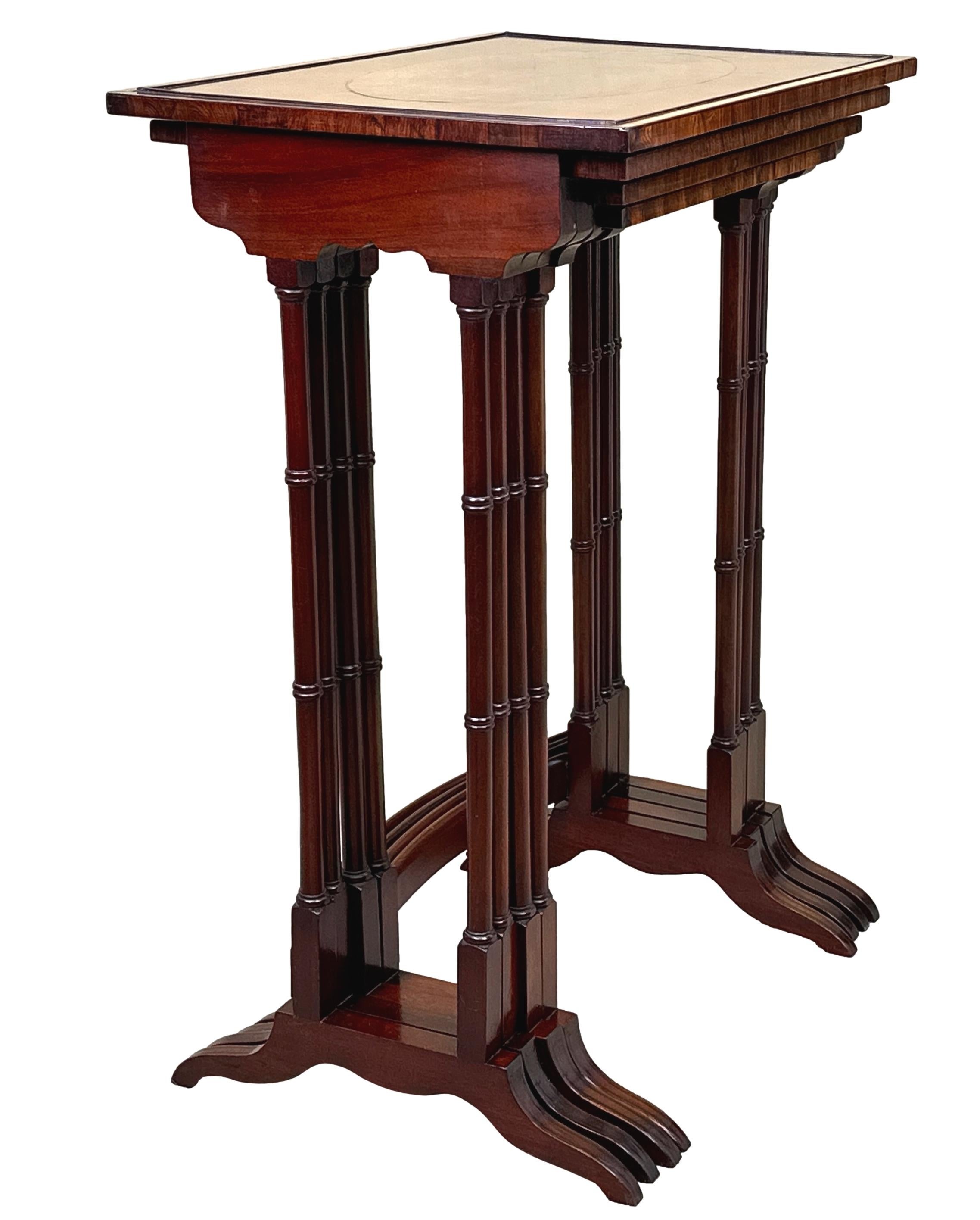 A Very Fine Quality Late 19th Century, Mahogany, Quartetto Nest Of Four Coffee Tables, Having Well Figured, Oval Inlaid, Tops With Cockbeaded Panelling And Attractive Crossbanded Edges, Raised On Elegant Turned Upright Supports United By Curved