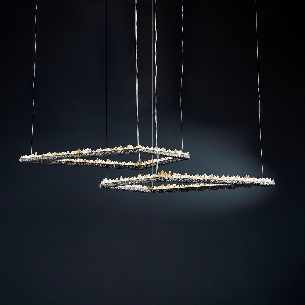 Quartz pendant light III by Aver
Dimensions: W 106 x D 56 x H 6 cm
Materials: Natural rocks, high-quality cut crystals, jewelry chains, hand blown glass, other.
Also Available: Matte black, rustic silver, oxidized graphite, and rustic bronze.

A
