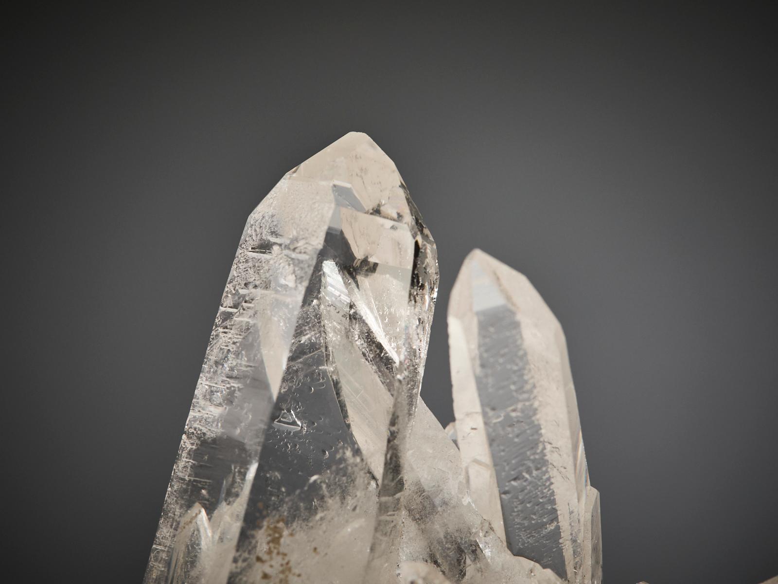 This exquisite quartz cluster from the Cabaçaco Claim, Minas Gerais, Brazil, features a stunning arrangement of perfectly transparent crystals of varying sizes, intertwined and gracefully overlapping to form a dynamic, sculptural composition.

A