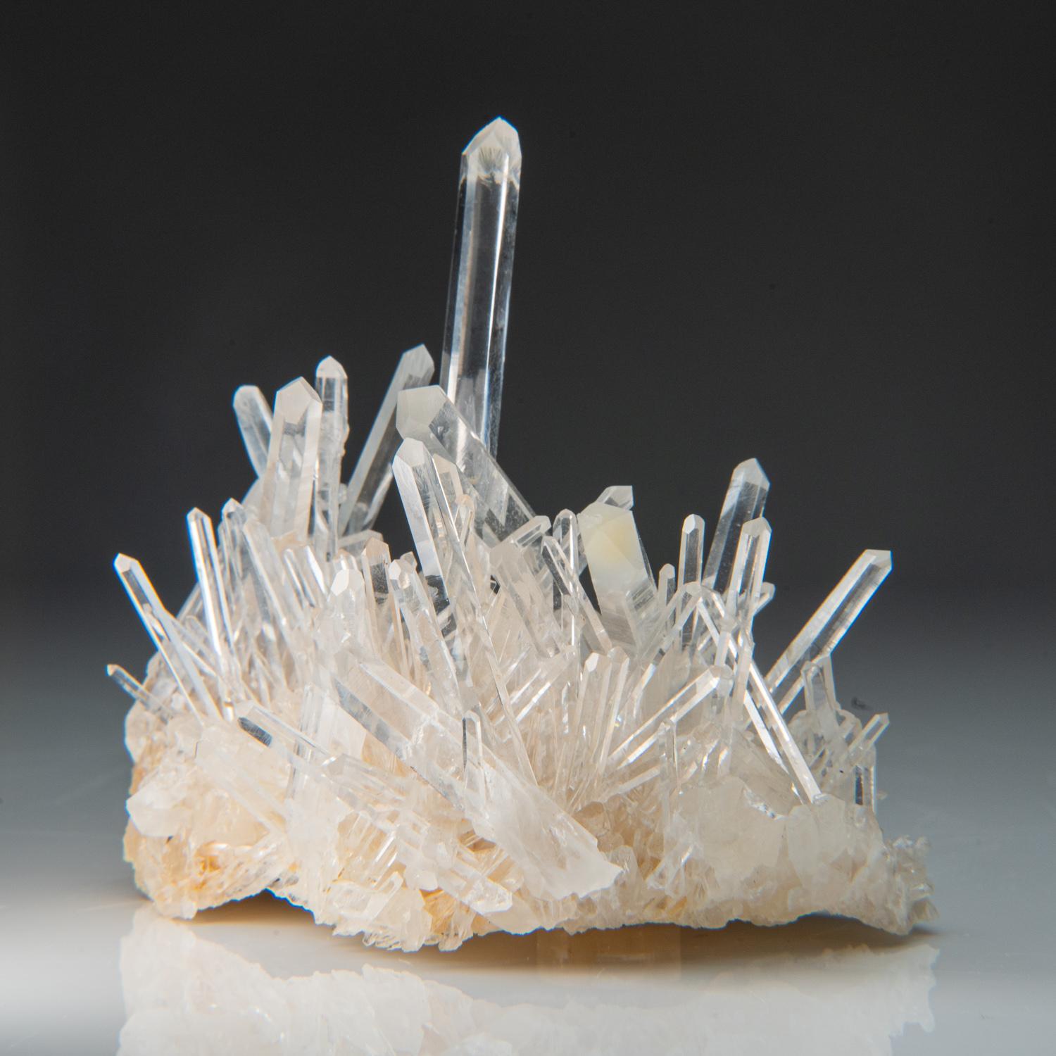 From Alto de Cruces, Suaita, Santander, Colombia

Authentic, cluster of many intersecting lustrous transparent colorless quartz crystals. The quartz crystals are exceptionally clean internally. The quartz cluster stands upright nicely without a