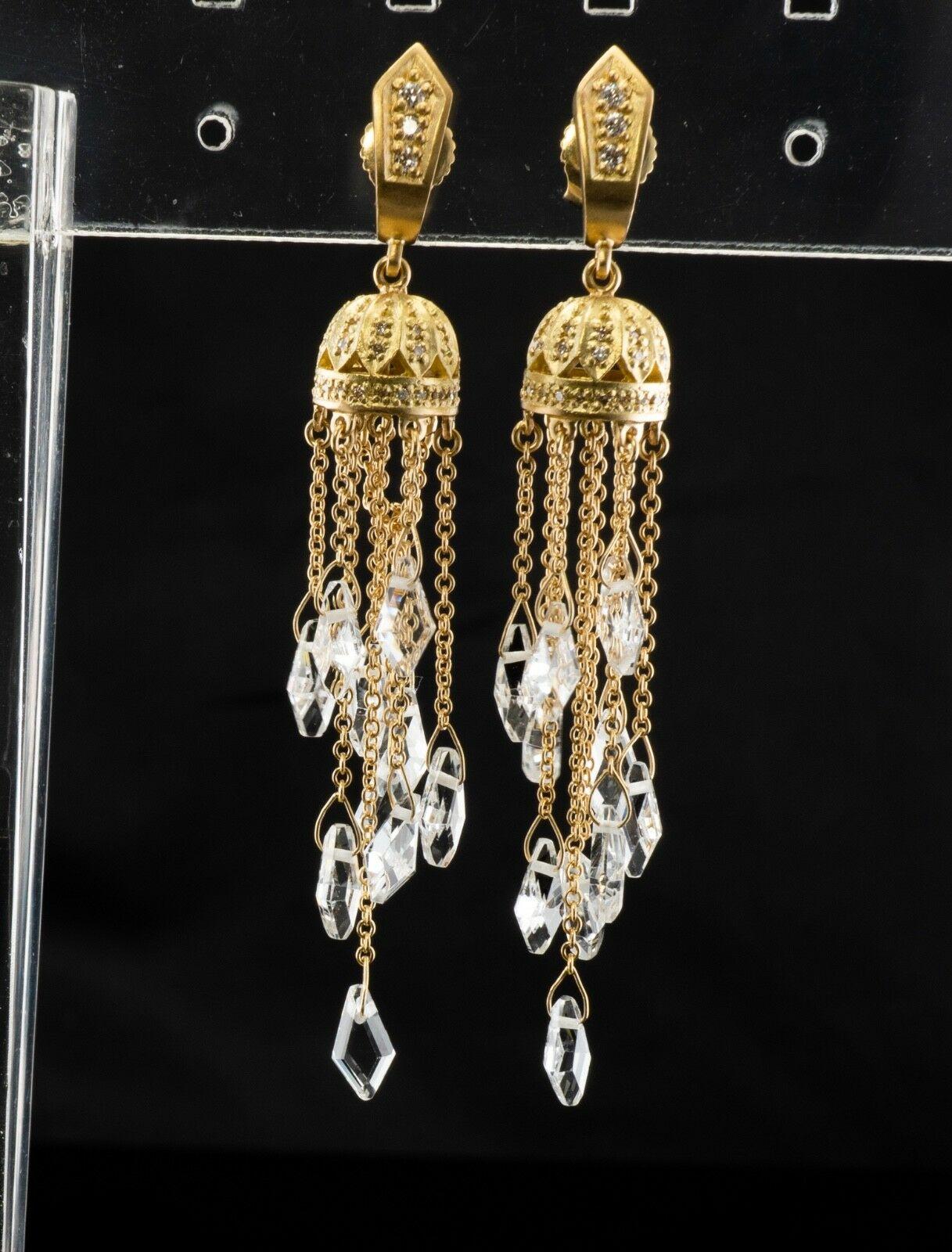 Quartz Crystal Herkimer  Earrings Dangle Drop Long

The dangle genuine cleanest and clearest Quartz (also called Herkimer diamonds) measure approximately 5mm each, amazing gems! The top of the earrings is studded with 35 small but white and fiery