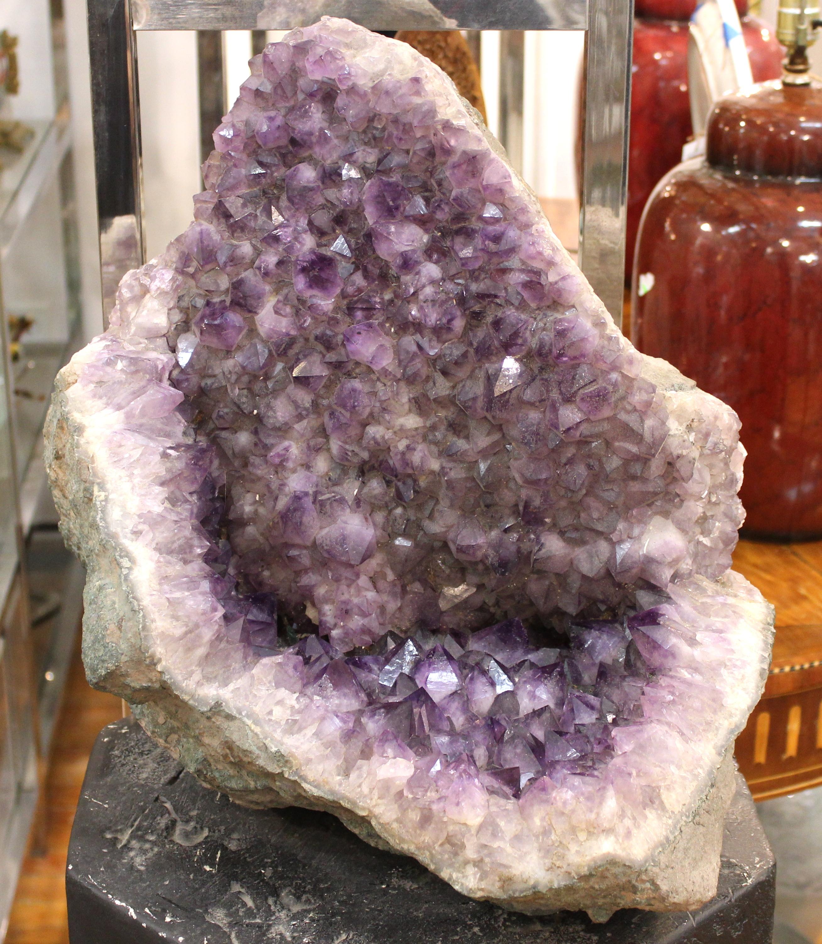 Large quartz crystal geode specimen.