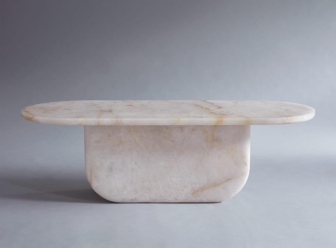 Quartz Crystal Table by Jude Heslin Di Leo
Dimensions: 124 x 48 x 38 cm
Materials: Solid quartz crystal slab

Originally conceived of as a meditation altar, Amplifier is a coffee table made of pure quartz crystal. Because of quartz natural ability
