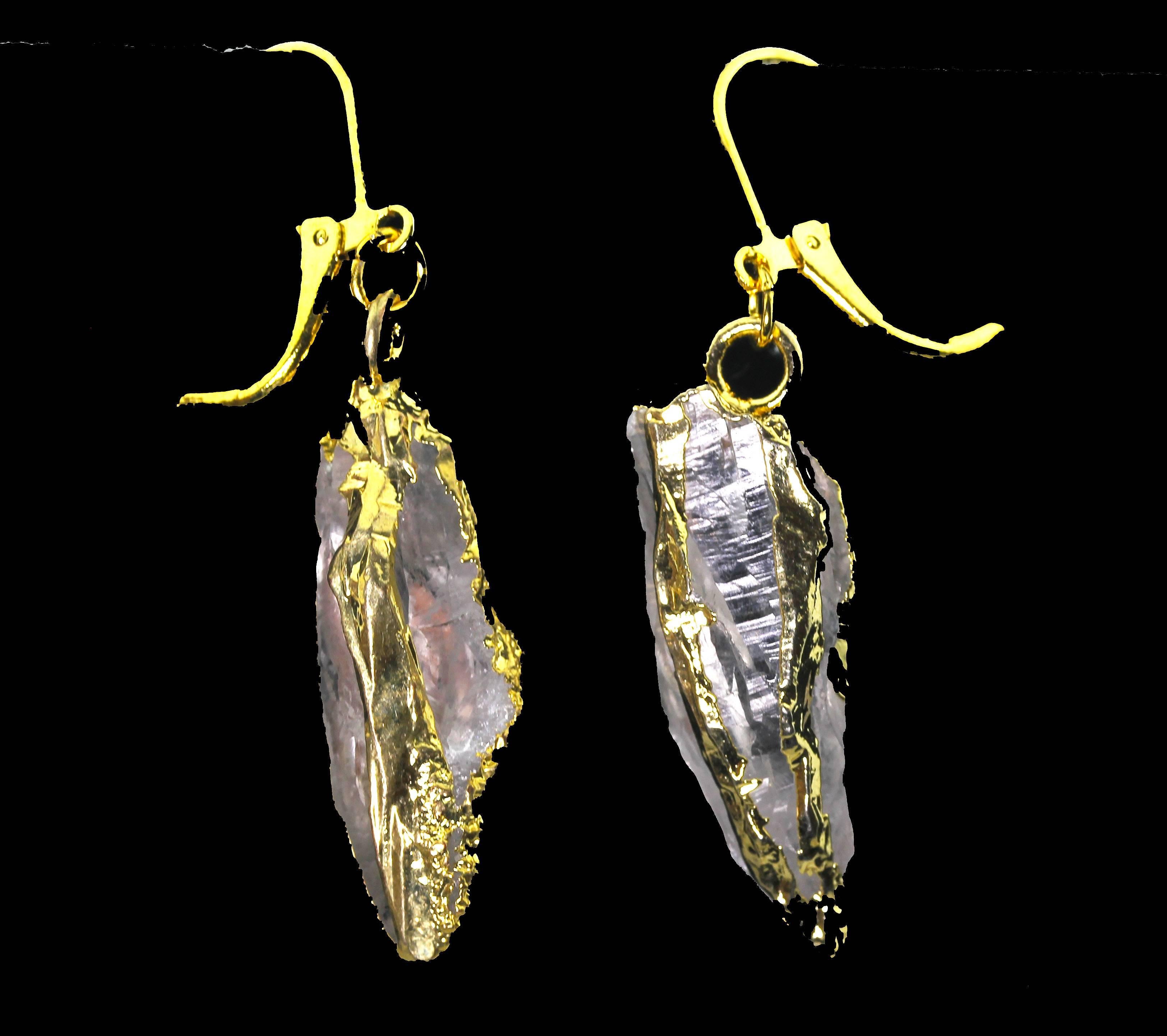 Glittering natural gemstone Quartz rock lever-back gold plated earrings.  They measure approximately 2 inches from the top of the lever to the bottom of the gemstones.  They are brilliantly glittery elegant for daytime into evening. 