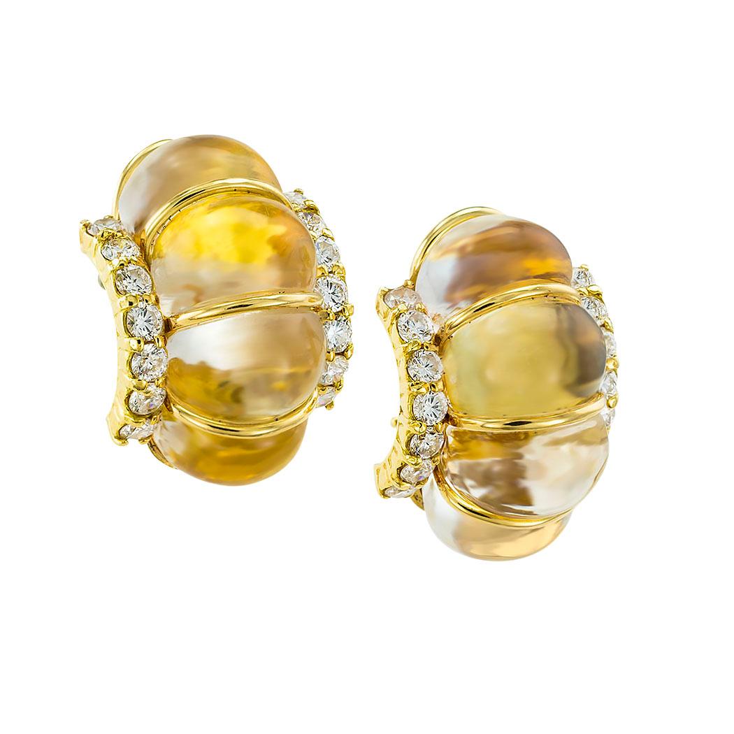Quartz diamonds and yellow gold clip-on half-hoop earrings circa 1980. *

SPECIFICATIONS:

GEMSTONES:  buff top, oval-shaped clear colored quartz displaying a hint of yellow color less intense than it appears in the photographs.

DIAMONDS: 