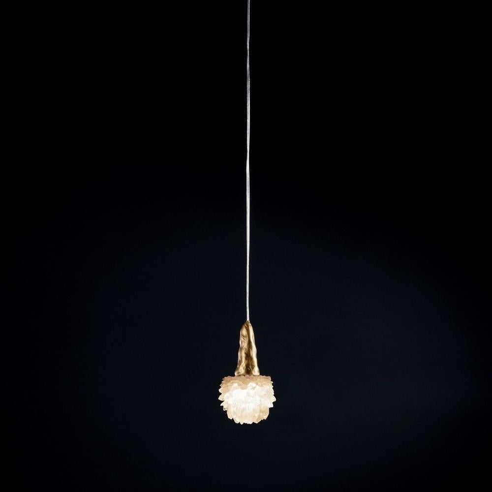 Quartz pendant light II by Aver
Dimensions: ? 12 x H 28 cm
Materials: Natural rocks, high-quality cut crystals, jewelry chains, hand-blown glass, other.
Also Available: Matte Black, Rustic Silver, Oxidized Graphite, and Rustic Bronze.

A series of