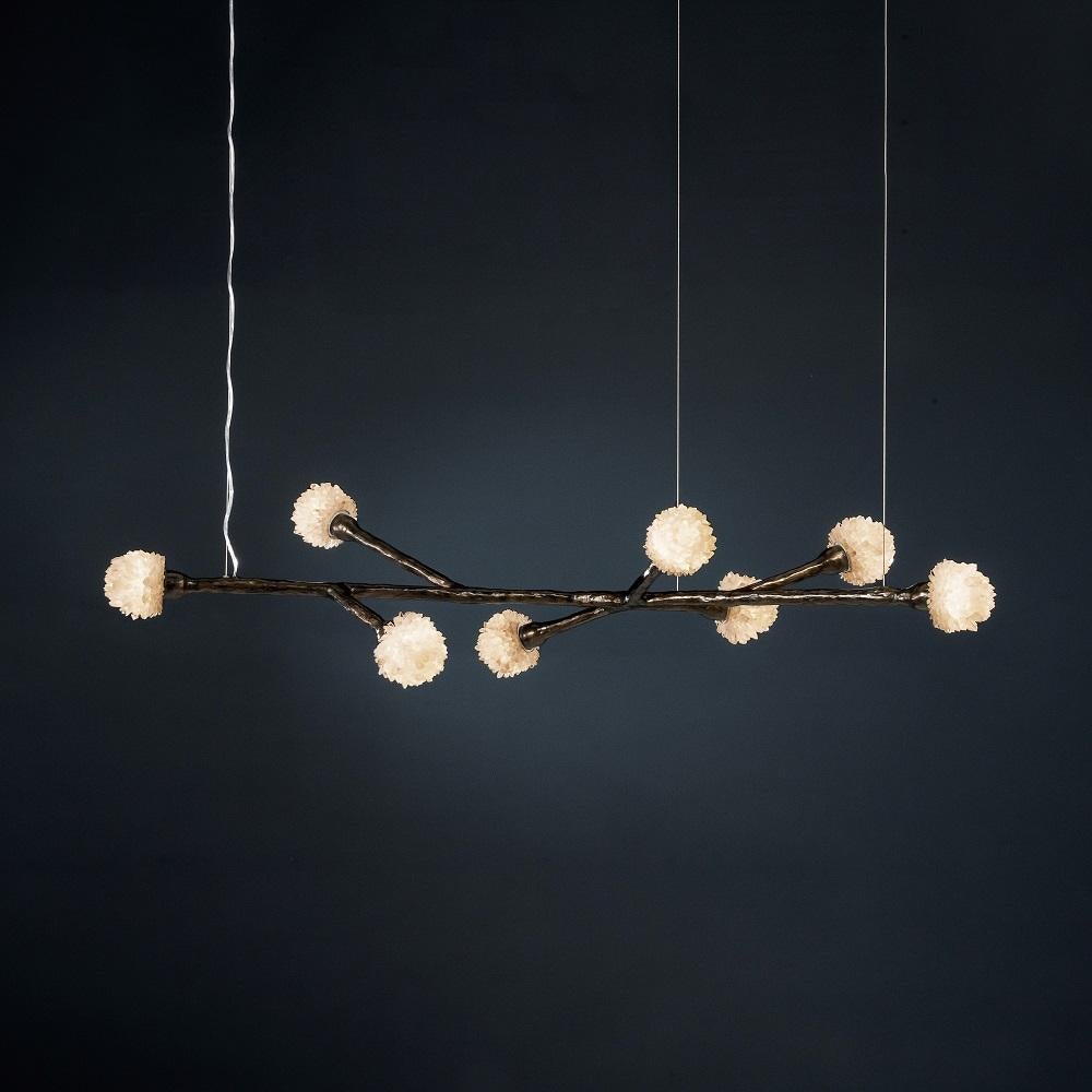 Quartz Pendant Light I by Aver
Dimensions: W 155 x D 60 x H 30 cm
Materials: Natural rocks, high-quality cut crystals, jewelry chains, hand-blown glass, other.
Also Available: Matte Black, Rustic Silver, Oxidized Graphite, and Rustic Bronze.

A