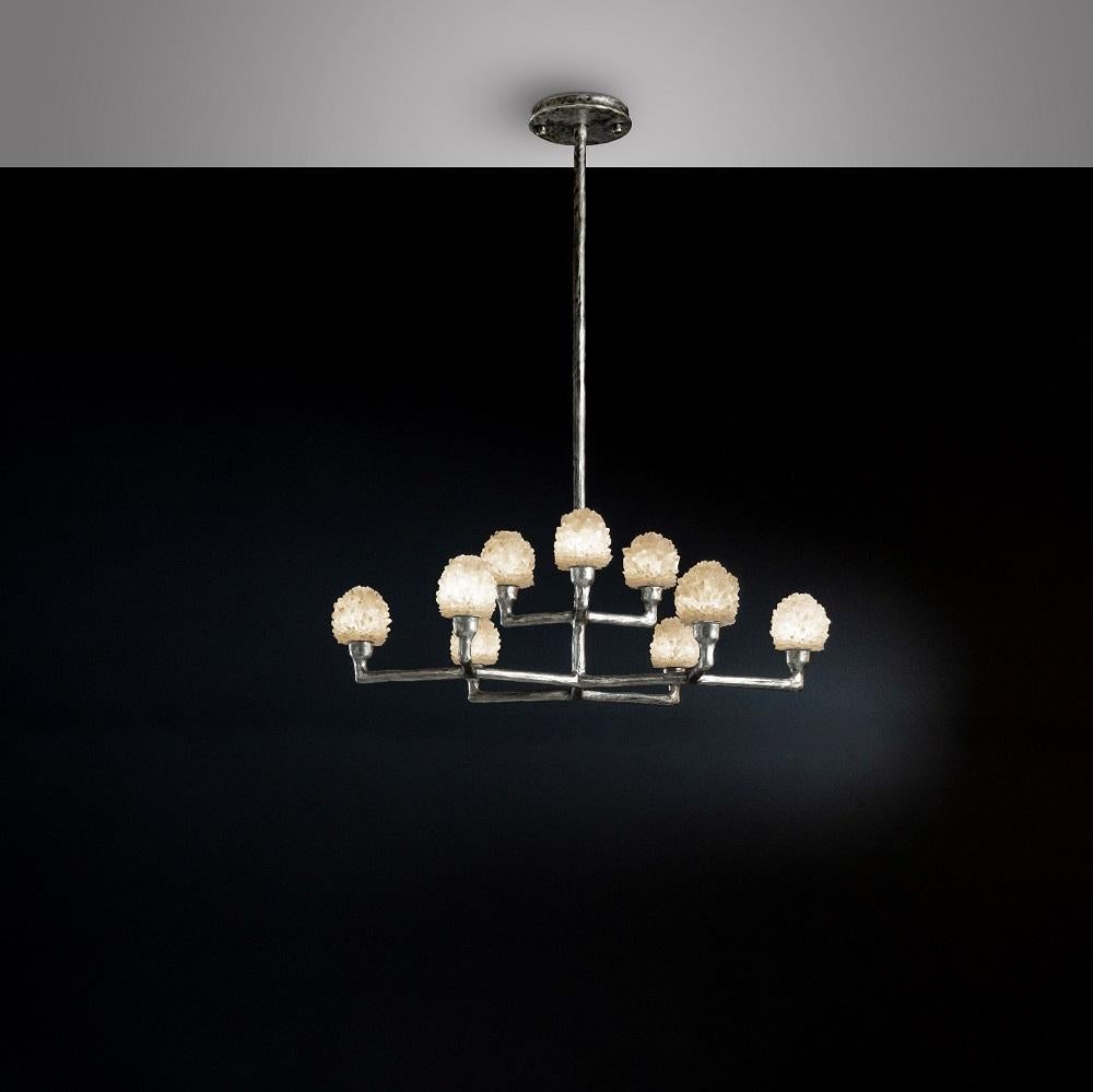 Quartz pendant light IV by Aver
Dimensions: D 100 x H 35 cm
Materials: Natural rocks, high-quality cut crystals, jewelry chains, hand-blown glass, other.
Also Available: Matte Black, Rustic Silver, Oxidized Graphite, and Rustic Bronze.

A series of