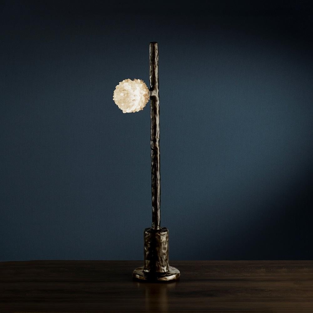 Quartz table lamp I by Aver
Dimensions: W 12 x D 22 x H 78 cm
Materials: Natural rocks, high-quality cut crystals, jewelry chains, hand-blown glass, other.
Also available: matte black, rustic silver, oxidized graphite, and rustic bronze.

A series
