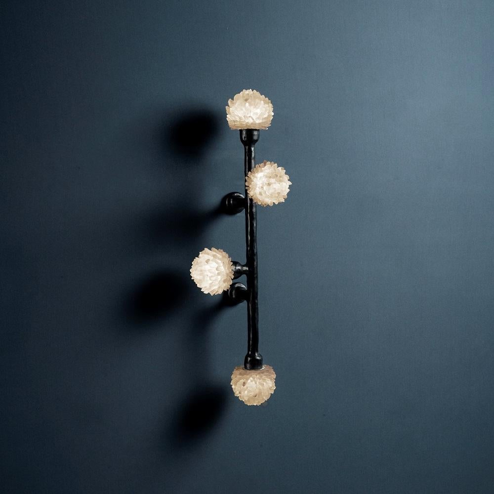 Quartz wall sconce III by Aver
Dimensions: W 21 x D 26 x H 75 cm
Materials: Natural rocks, high-quality cut crystals, jewelry chains, hand-blown glass, other.
Also Available: Matte Black, Rustic Silver, Oxidized Graphite, and Rustic Bronze.

A