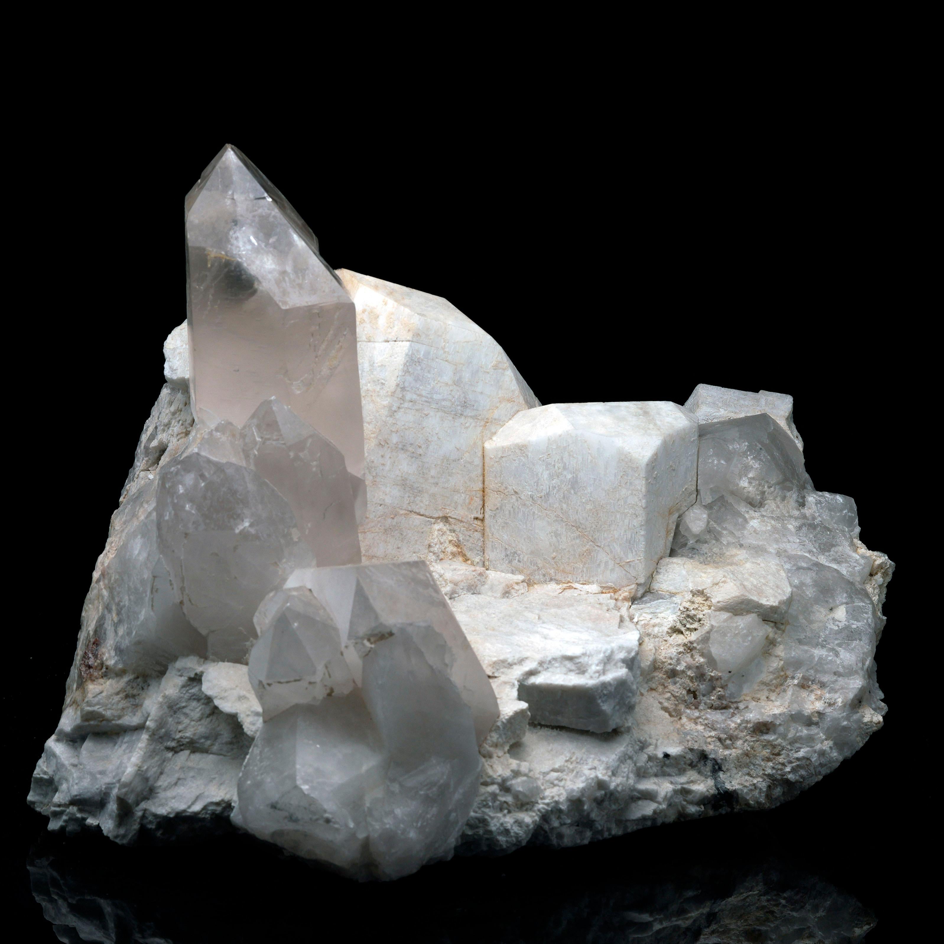 This centerpiece-quality specimen features huge, naturally lustrous, perfectly terminated quartz crystals against equally large, blocky, contrastingly opaque bluish-gray microcline feldspar crystals for an aesthetically stunning study in