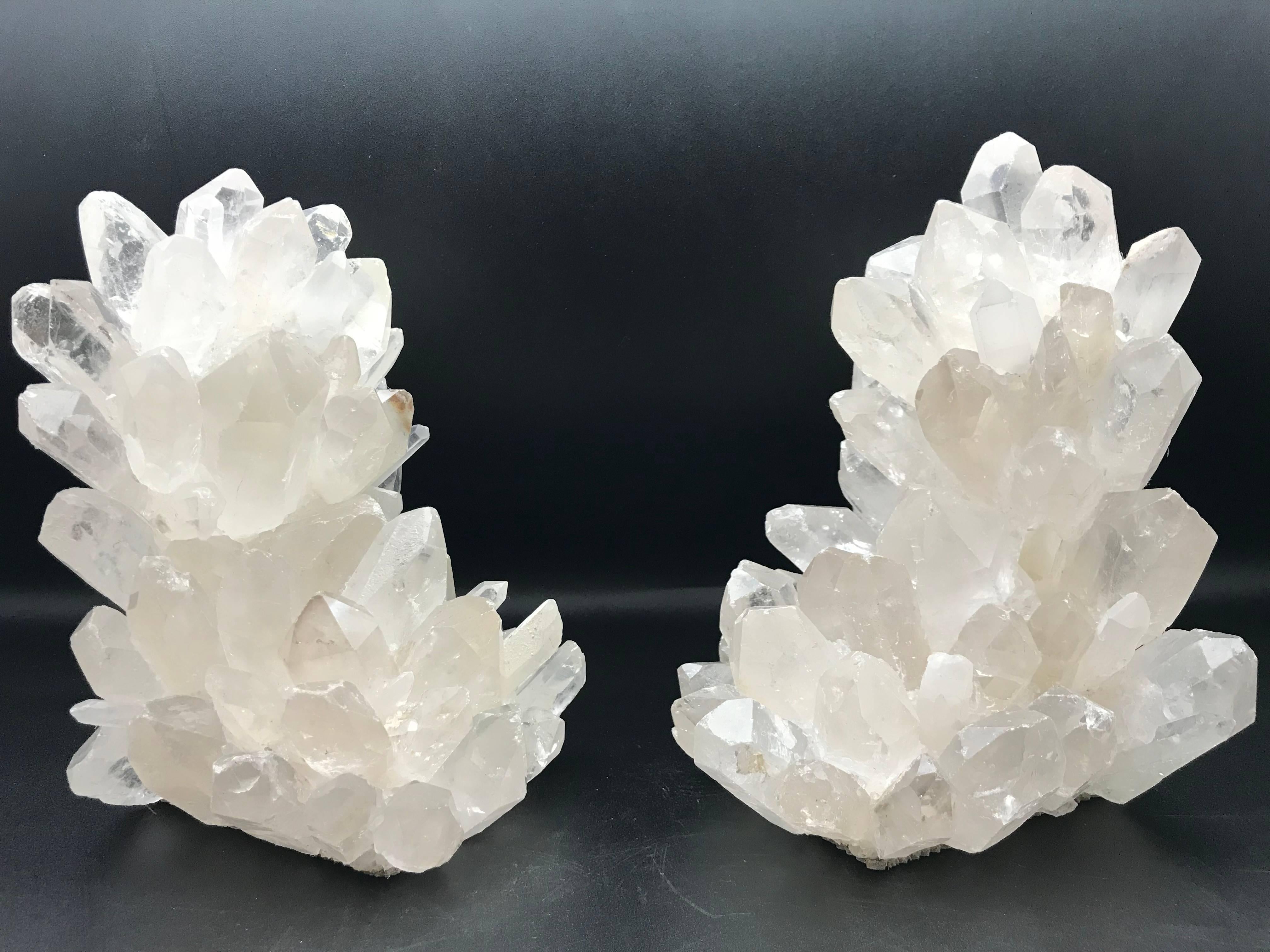 Beautiful pair of quartz bookends that were handcrafted in the USA. Quartz crystal is an excellent element to bring into the home. It has held a long history in the hearts and minds of people in many cultures. Feng Shui principals believe that a