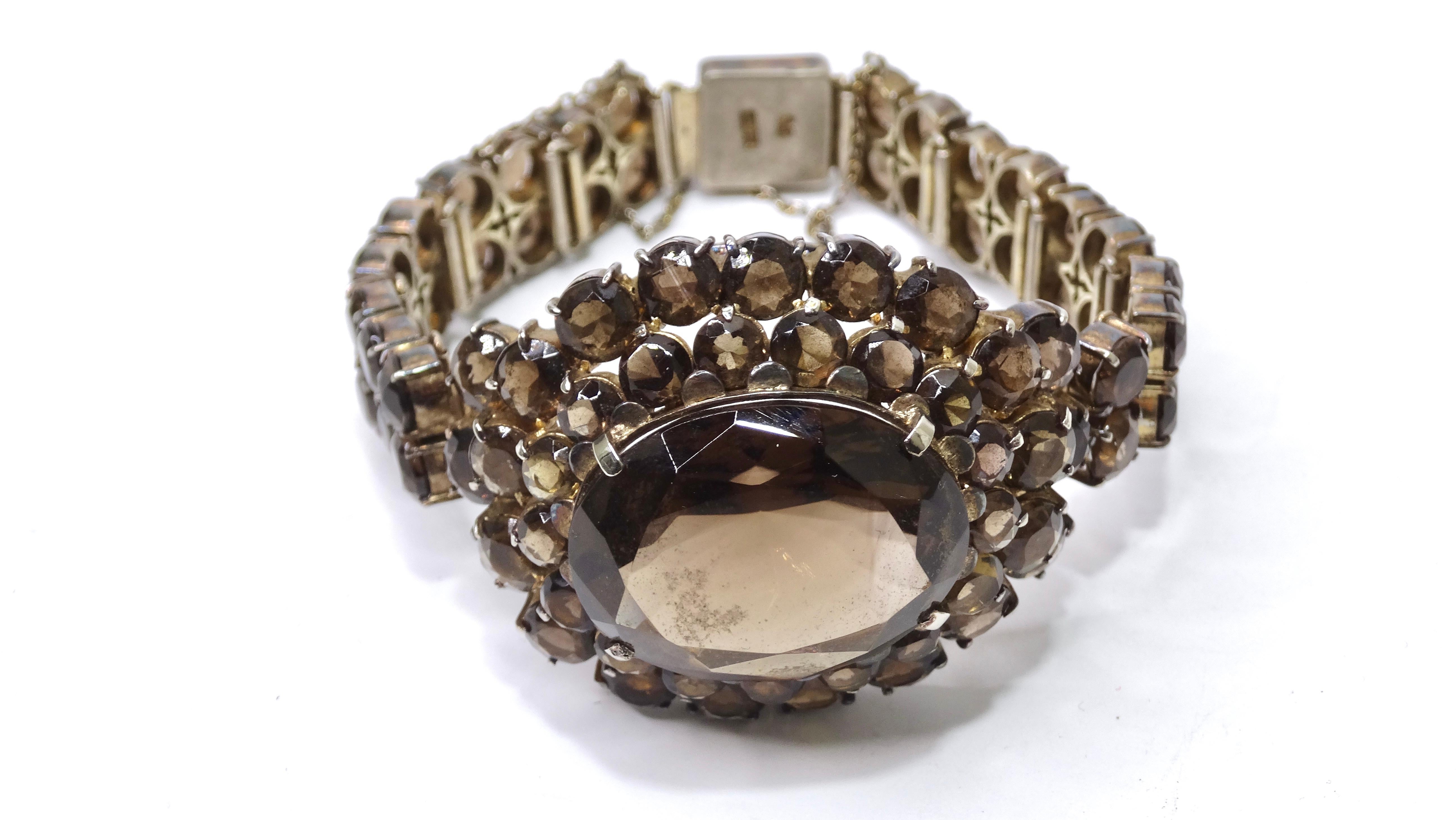 Do not miss out on the chance to get this ultra-rare piece of fine jewelry that you cannot get anywhere else! This bracelet will make your outfit! This vintage 1950's silver quartz encrusted bracelet has to be in your jewelry collection! It is
