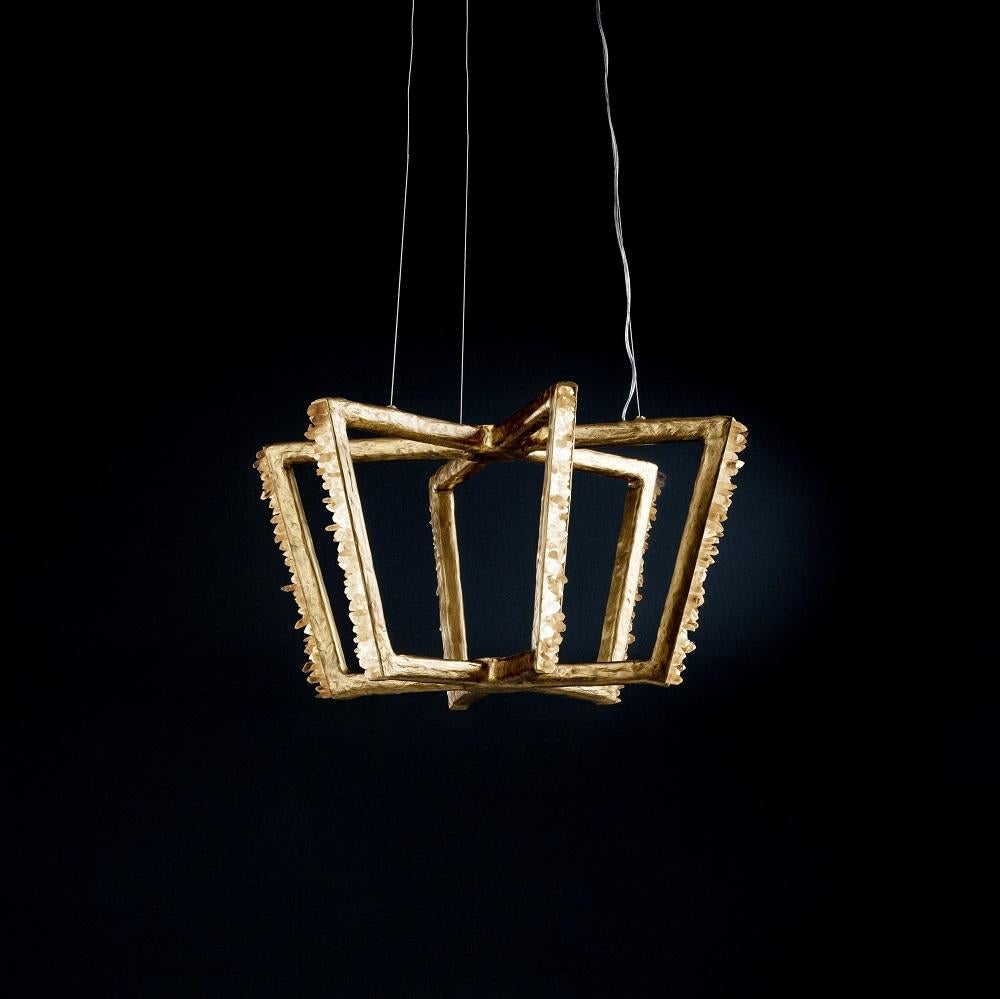 Quartz and Bronze Pendant Light I by Aver
Dimensions: D 82 x H 42 cm
Materials: Natural rocks, high-quality cut crystals, jewelry chains, hand-blown glass, other.
Also Available: Matte Black, Rustic Silver, Oxidized Graphite, and Rustic Bronze.

The