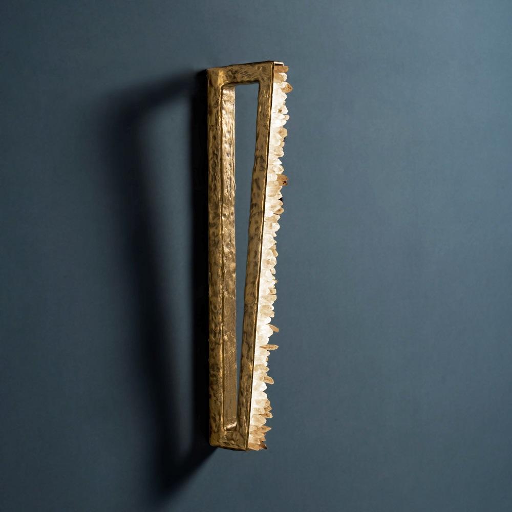 Quartz and Bronze Wall Light I by Aver
Dimensions: W 4 x D 18 x H 70 cm
Materials: Natural rocks, high-quality cut crystals, jewelry chains, hand-blown glass, other.
Also Available: Matte Black, Rustic Silver, Oxidized Graphite, and Rustic