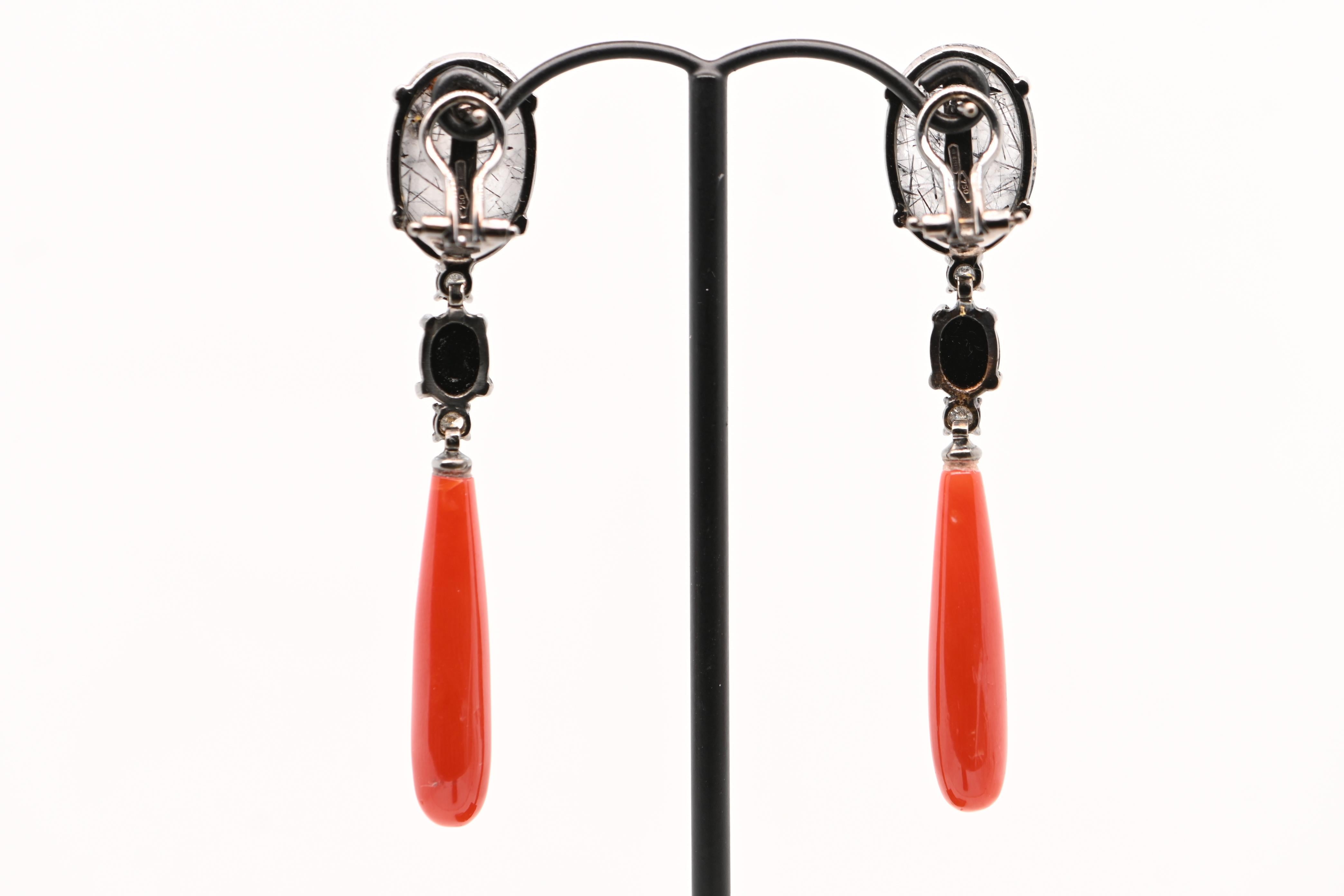 Quartz Agathe Diamonds 0.280 Carats Black Gold 18 Carats Earrings. 
These earrings are distinguished by their elegance. They are composed of tourmaline in cabochon, adorned with two diamonds for each loop encircling a pearl in black quartz. The four