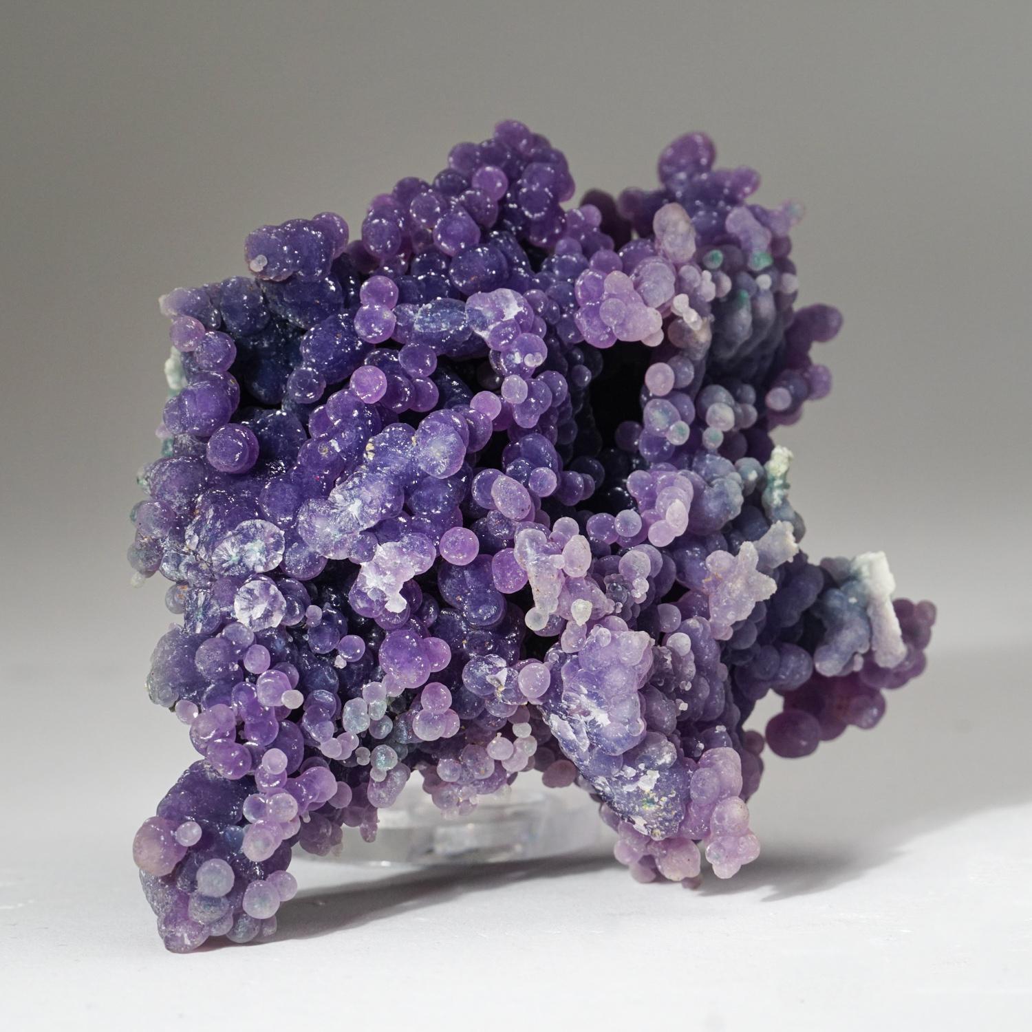 From near Pantai Manakarra, Mamuju, Sulawesi, Indonesia Double-sided cluster of translucent grape purple quartz agate in spherical formations with a radial internal structure and are found in cavities in pillow basalt. Also known as Grape Agate.