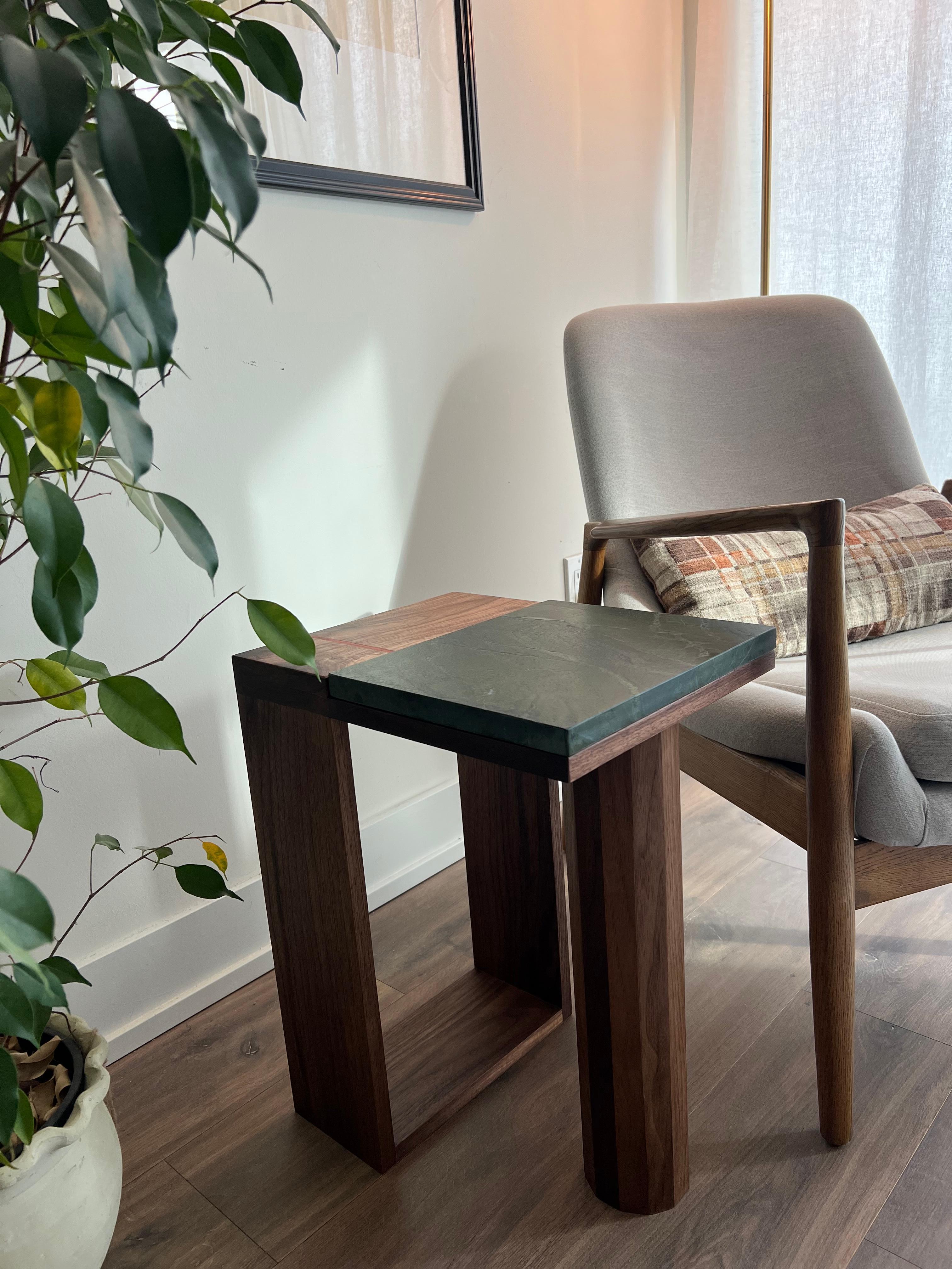 Where Earth Meets Structure
A dialogue between stone and wood—where the rich, fluid grain of solid walnut embraces the raw elegance of Avocatus quartzite. A bold red line, a heartbeat in the composition, marking the union of organic elements. The
