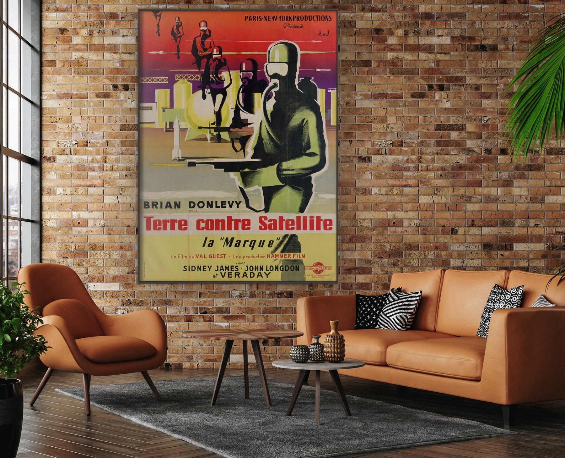 Quatermass II / Terre Contre Satellite ist ein Hammer-Horror aus den 1950er Jahren unter der Regie von Val Guest und mit Brian Donlevy, John Longden und Sid James in den Hauptrollen. Wir bewundern dieses französische Grande-Plakat aus dem ersten