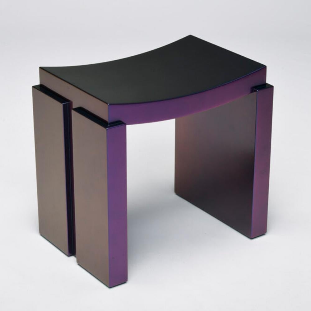 This custom designed stool is Japanese inspired with a dichroic color shifting auto finish which changes color as you move around the piece and reacts with different lighting.

As President and Principal of Christine Desiree Furniture and Interior