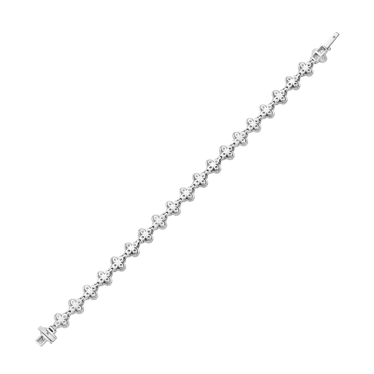 Mixed Cut Quatrefoil Halo Diamond Tennis Bracelet Made in 18k White Gold For Sale