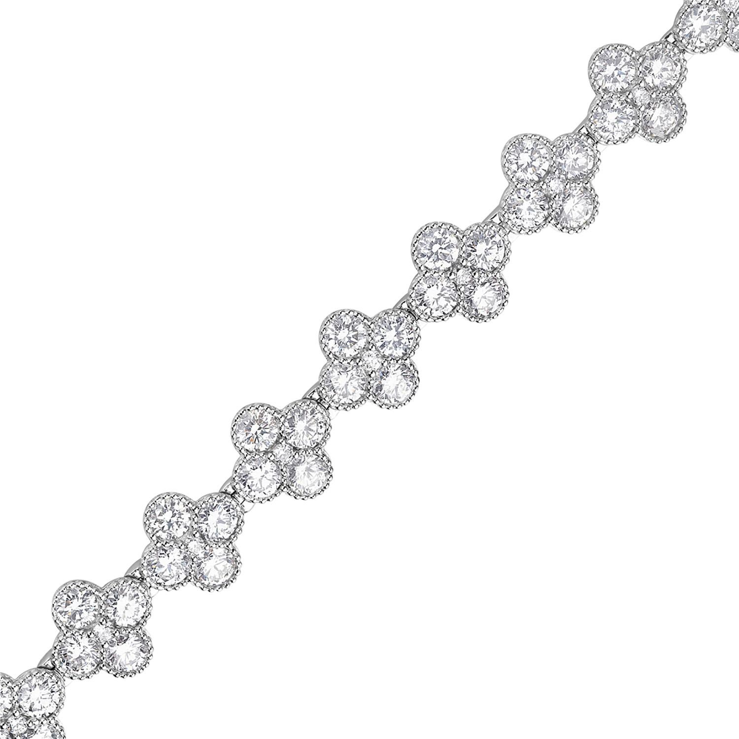 Women's Quatrefoil Halo Diamond Tennis Bracelet Made in 18k White Gold For Sale