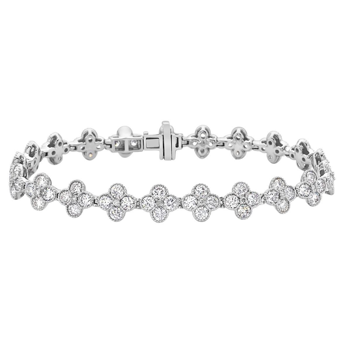 Quatrefoil Halo Diamond Tennis Bracelet Made in 18k White Gold For Sale