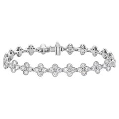Bracciale tennis con diamanti a raggiera a tre punte in oro bianco 18 carati
