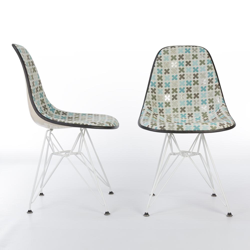 A revitalized pair of the iconic Eames DSR chair. These original Herman Miller shells have been re-adorned in original Alex Girard fabric called 'Quatrofoil'. Pair with their used, newer, DSR eiffel bases, these make for some great looking examples