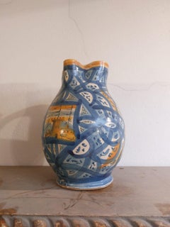 Four Italian majolica pitchers