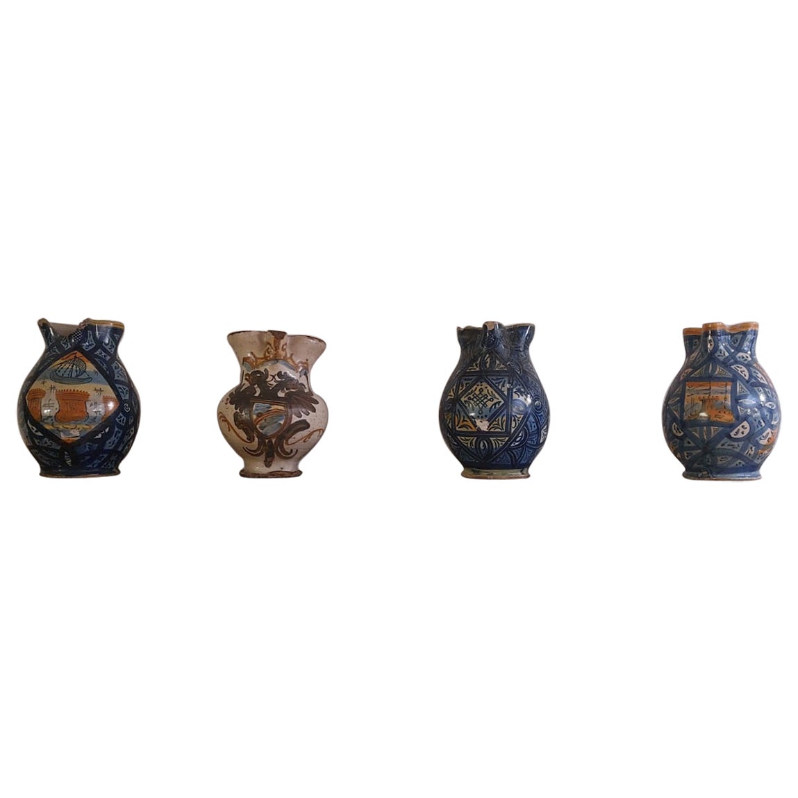 Four Italian majolica pitchers For Sale