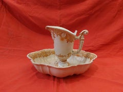 Four jugs with ceramic basins