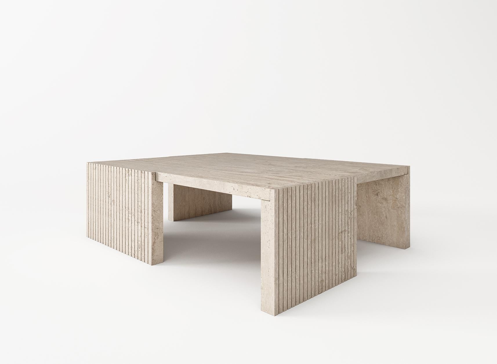 QUATTRO
Unfilled solid travertine coffee table.
Reinterpretation of 1970s Italian coffee table designs.

Available in different colors of travertine and custom-sizing.

Designed by Buket Hoscan Bazman 
 