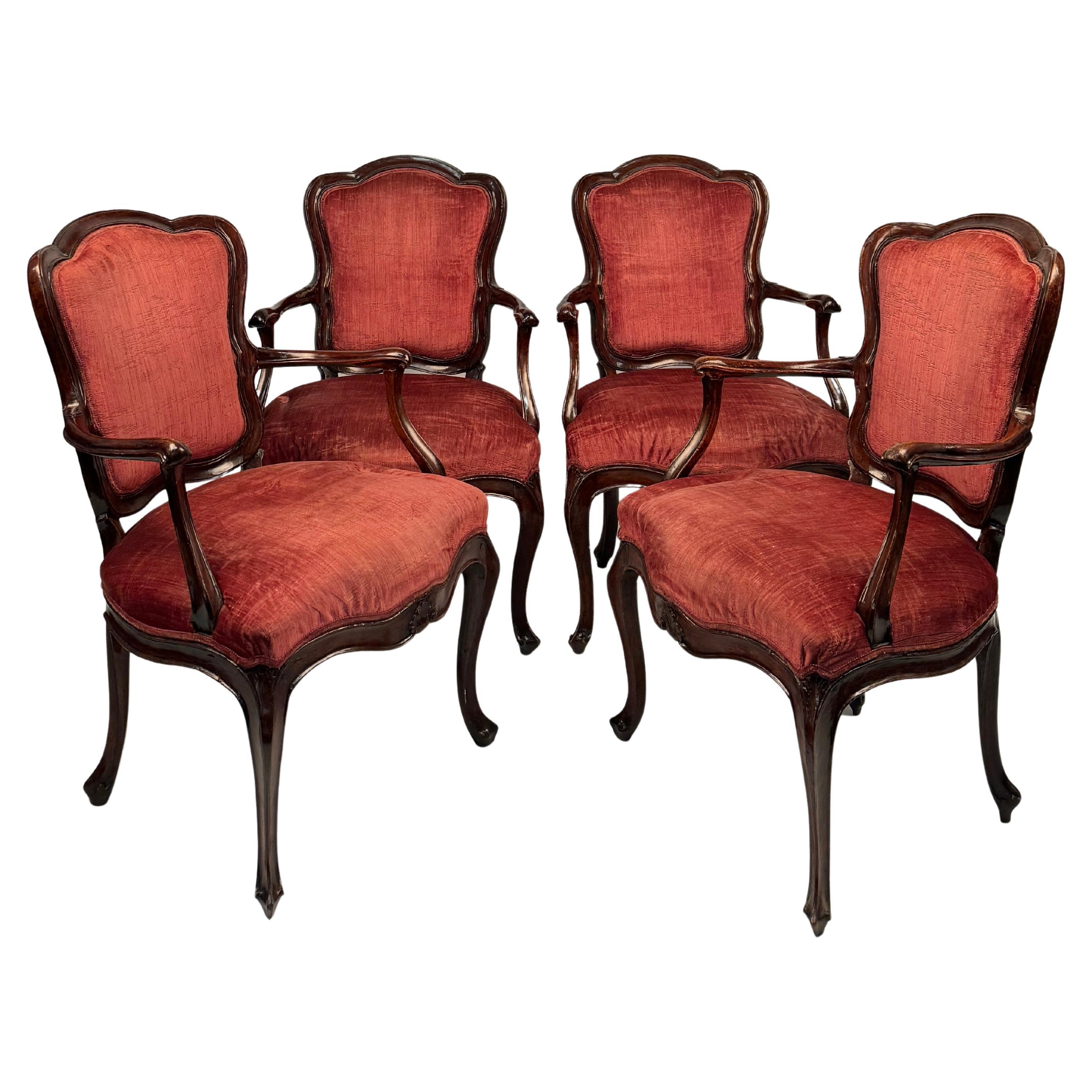 Four walnut armchairs, Venice, mid-18th century
