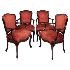Four walnut armchairs, Venice, mid-18th century