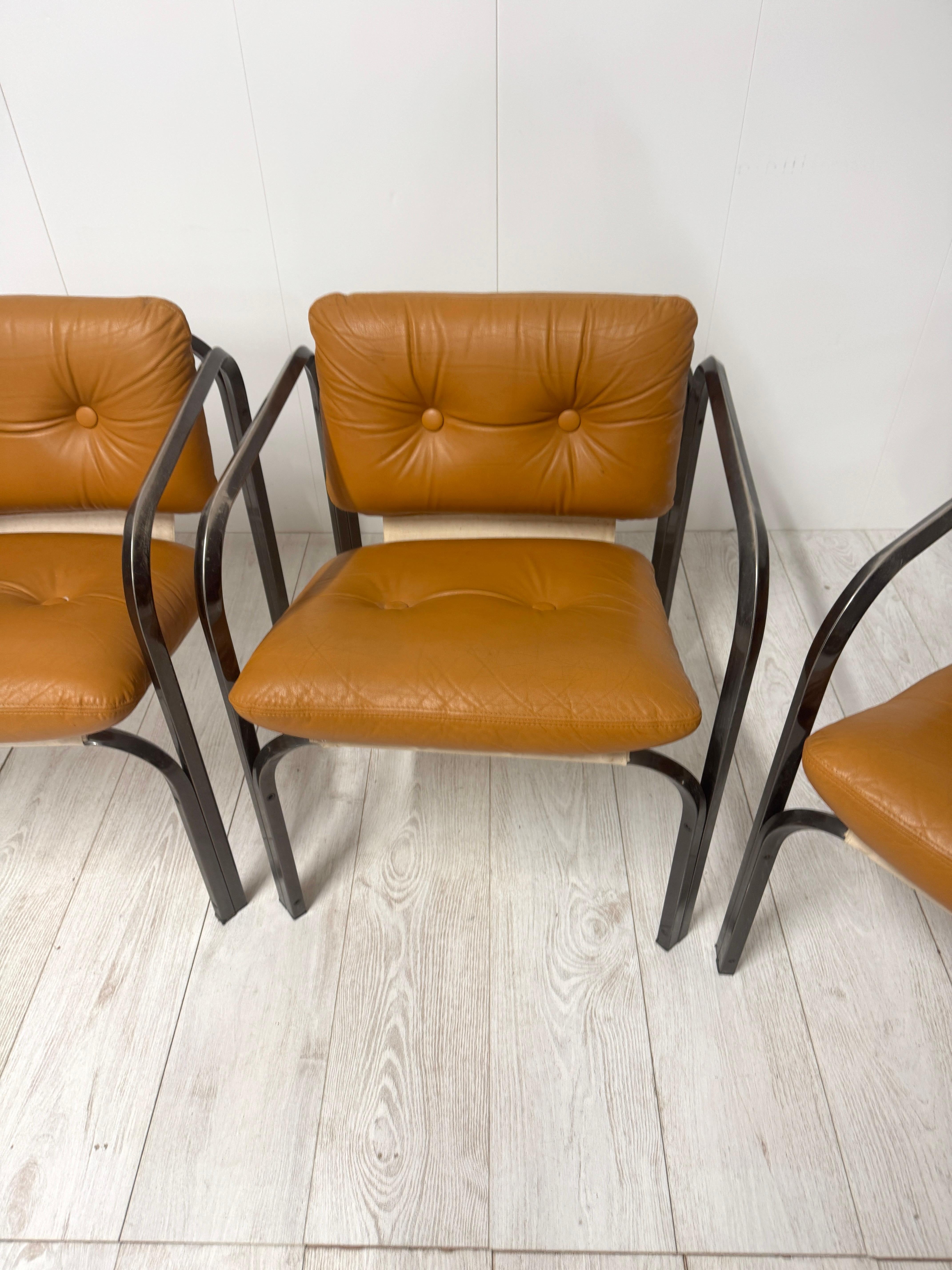 Steel Four leather chairs,  prod. Italian, 1970s For Sale