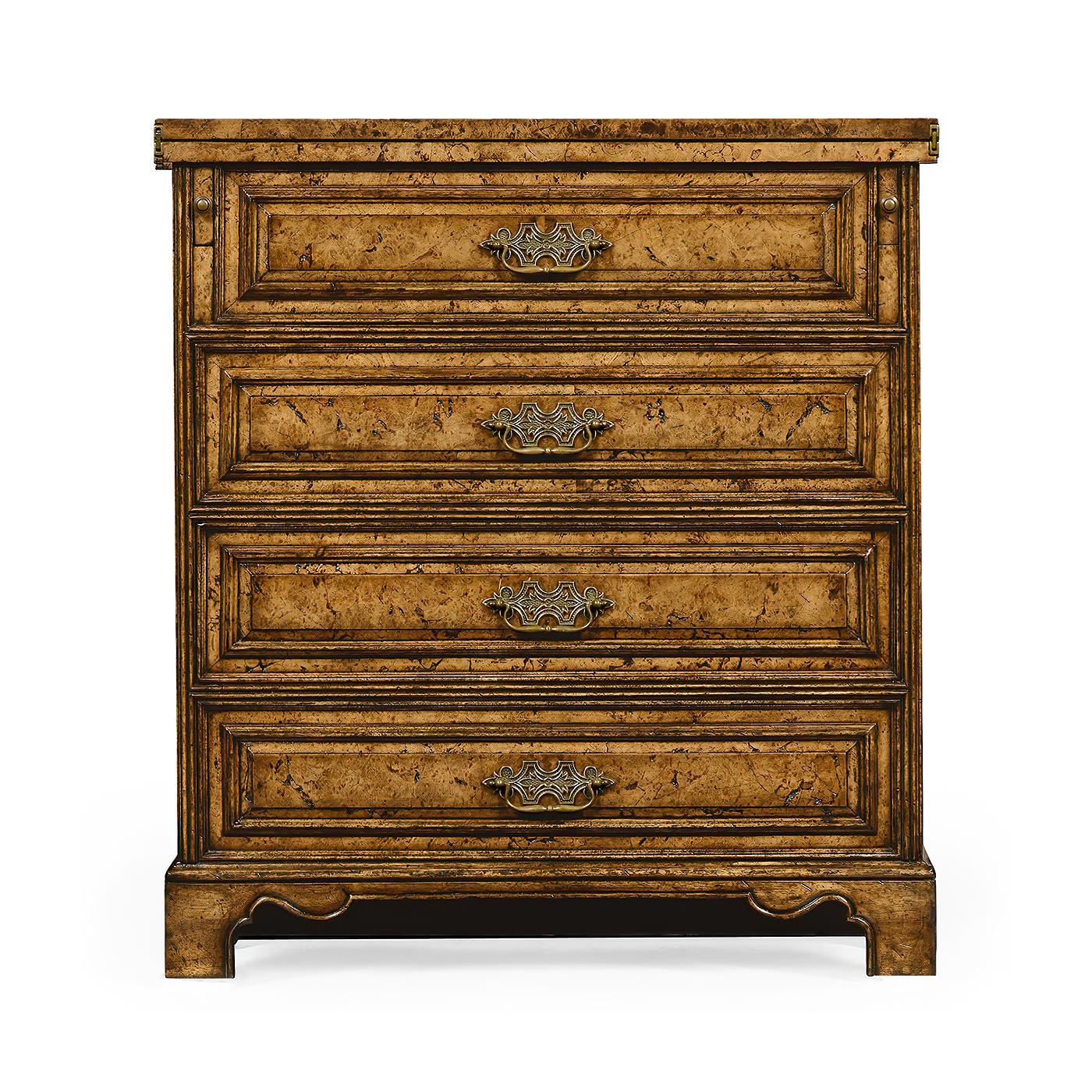 Queen Anne style burr oak four drawer chest of drawers in burl veneer of small proportions, the top with a hinged dressing surface inset with leather panels which rests on pull-out slides. Patinated brass handles and plates.

Dimensions: 29
