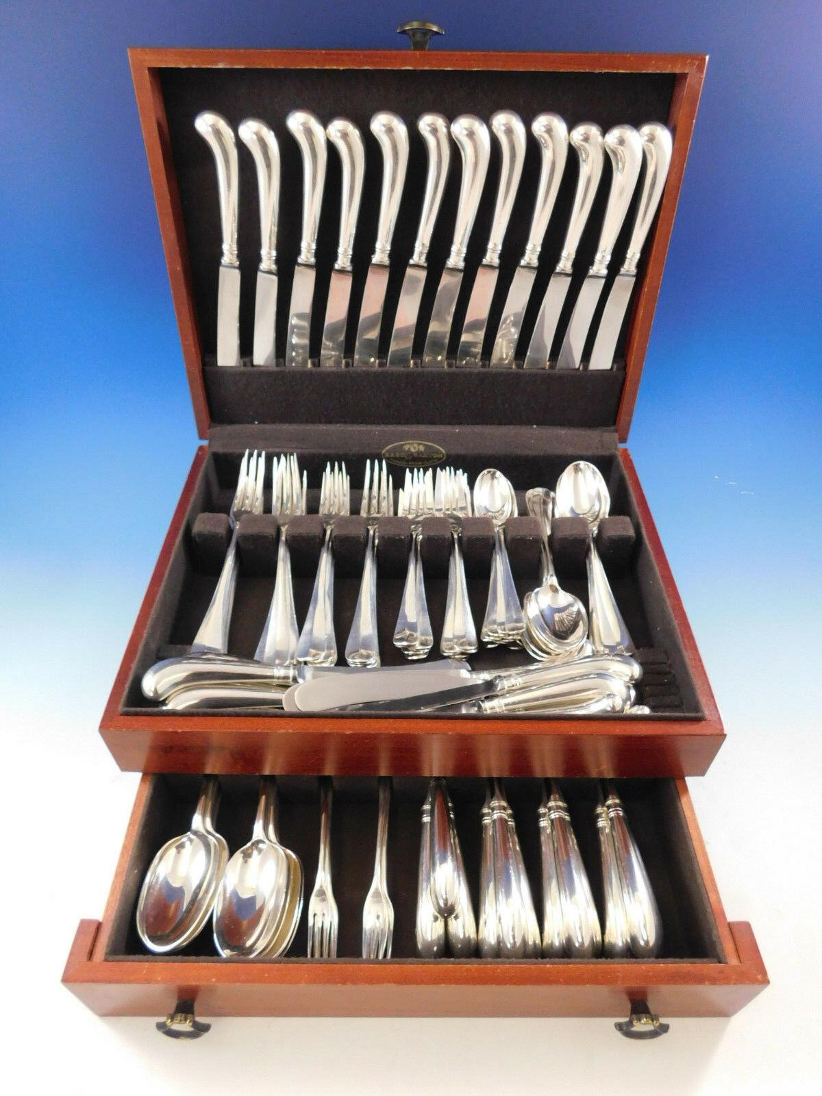 Superb Queen Anne by James Robinson Sterling Silver Flatware set, 120 pieces. This set includes:

12 Dinner Size Knives, wonderful pistol handles, 9 5/8