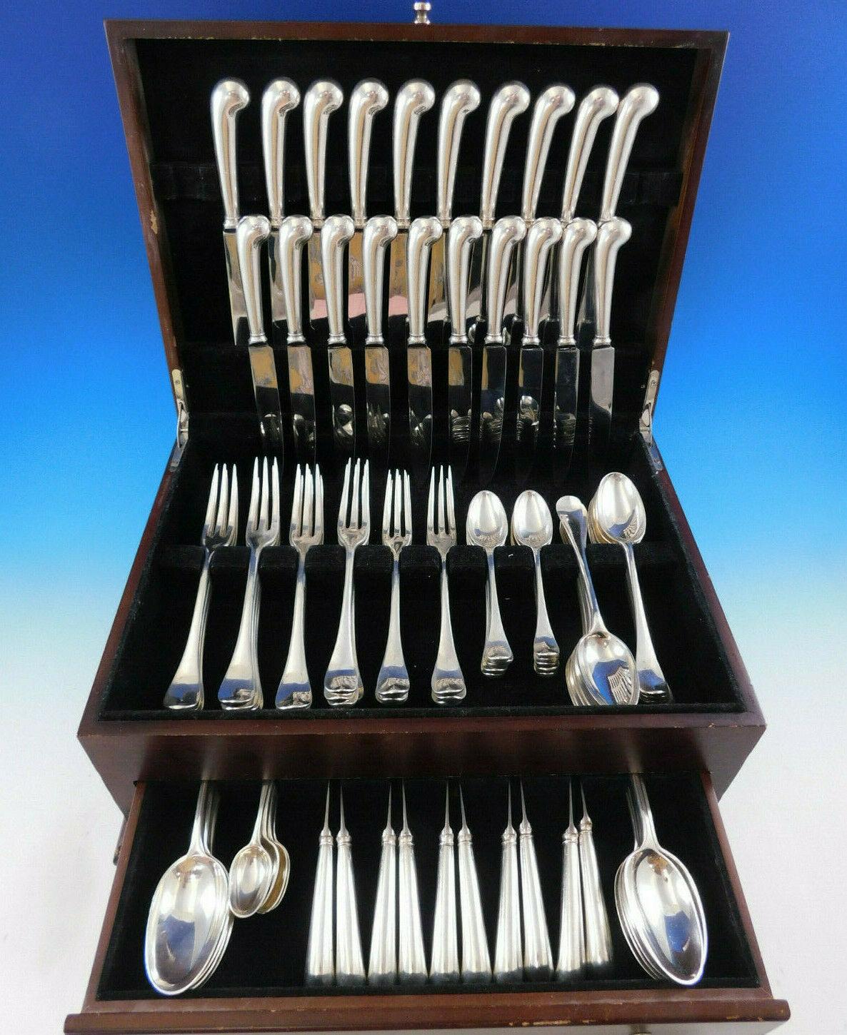 Queen Anne by Robert Welch (England) sterling silver flatware set, 86 pieces. This set was made in the year 1972 and includes:

10 dinner knives, pistol grip handle, 9 3/8