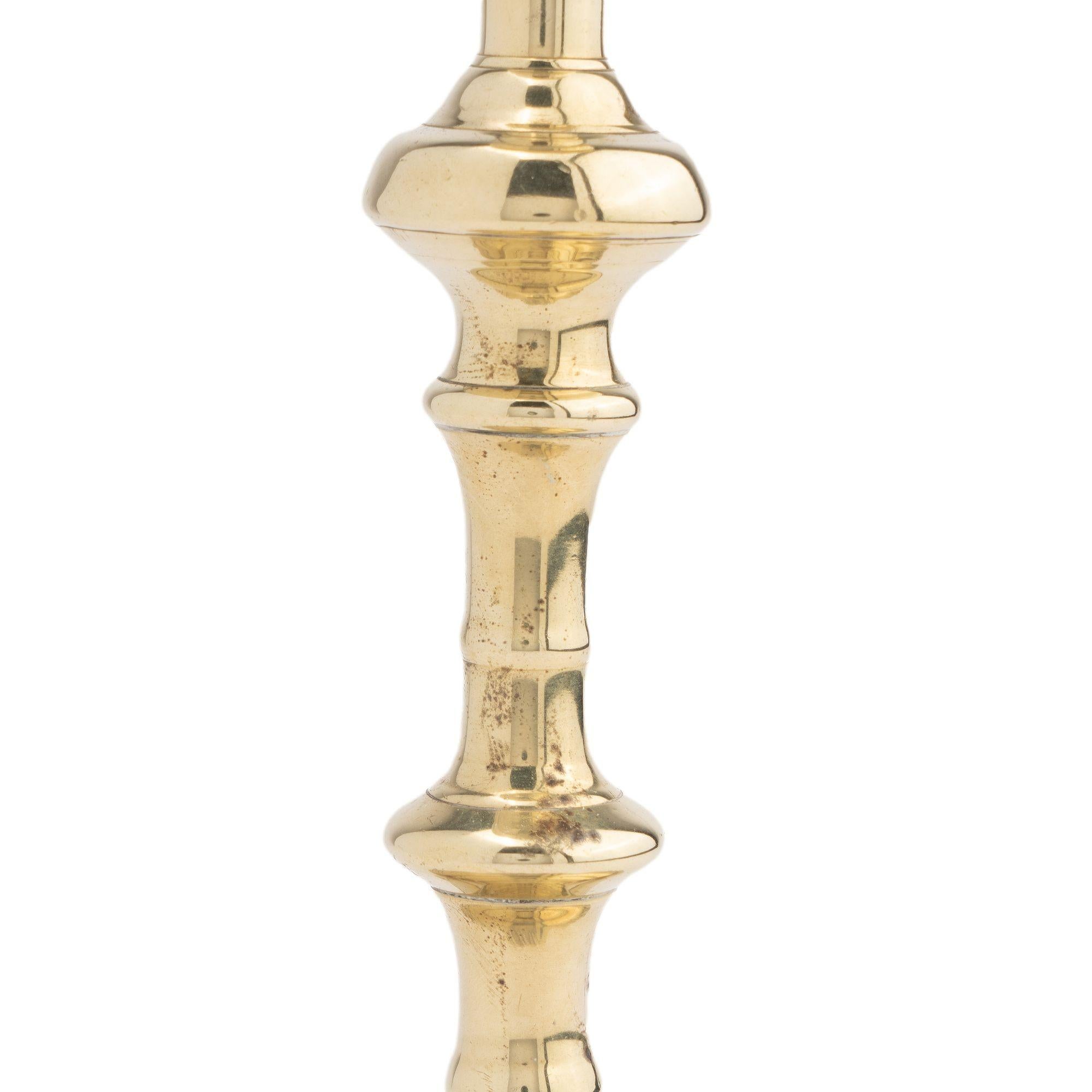 Brass Queen Anne cast brass swirl base candlestick, 1750-75 For Sale