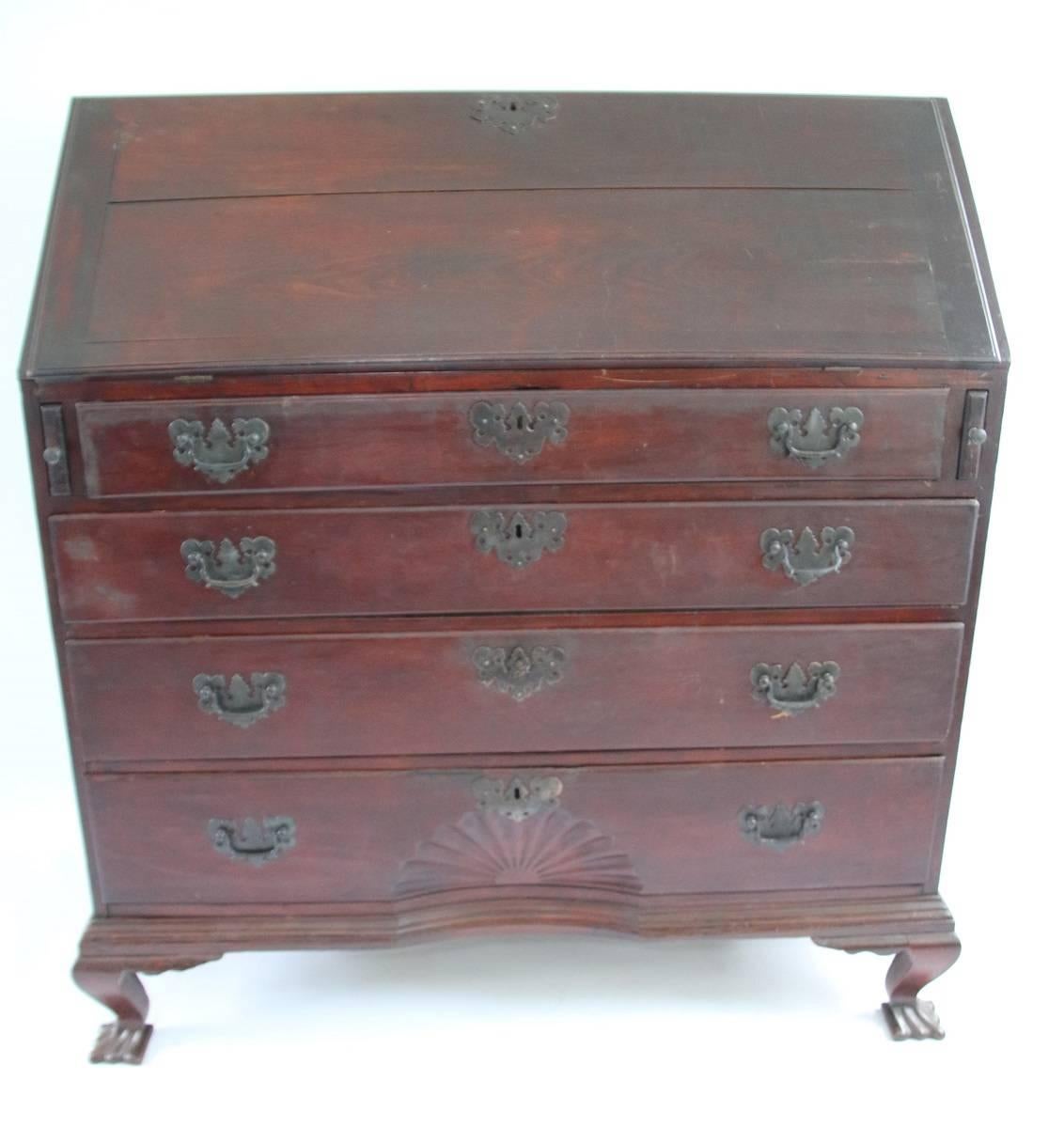 The Beard Family Queen Anne Connecticut slant front desk attributed to Ebenezer Hubbell, having a cherry (front) and sycamore (sides) case in original red stain with black varnish, possessing four graduated drawers. The bottom drawer has a nicely