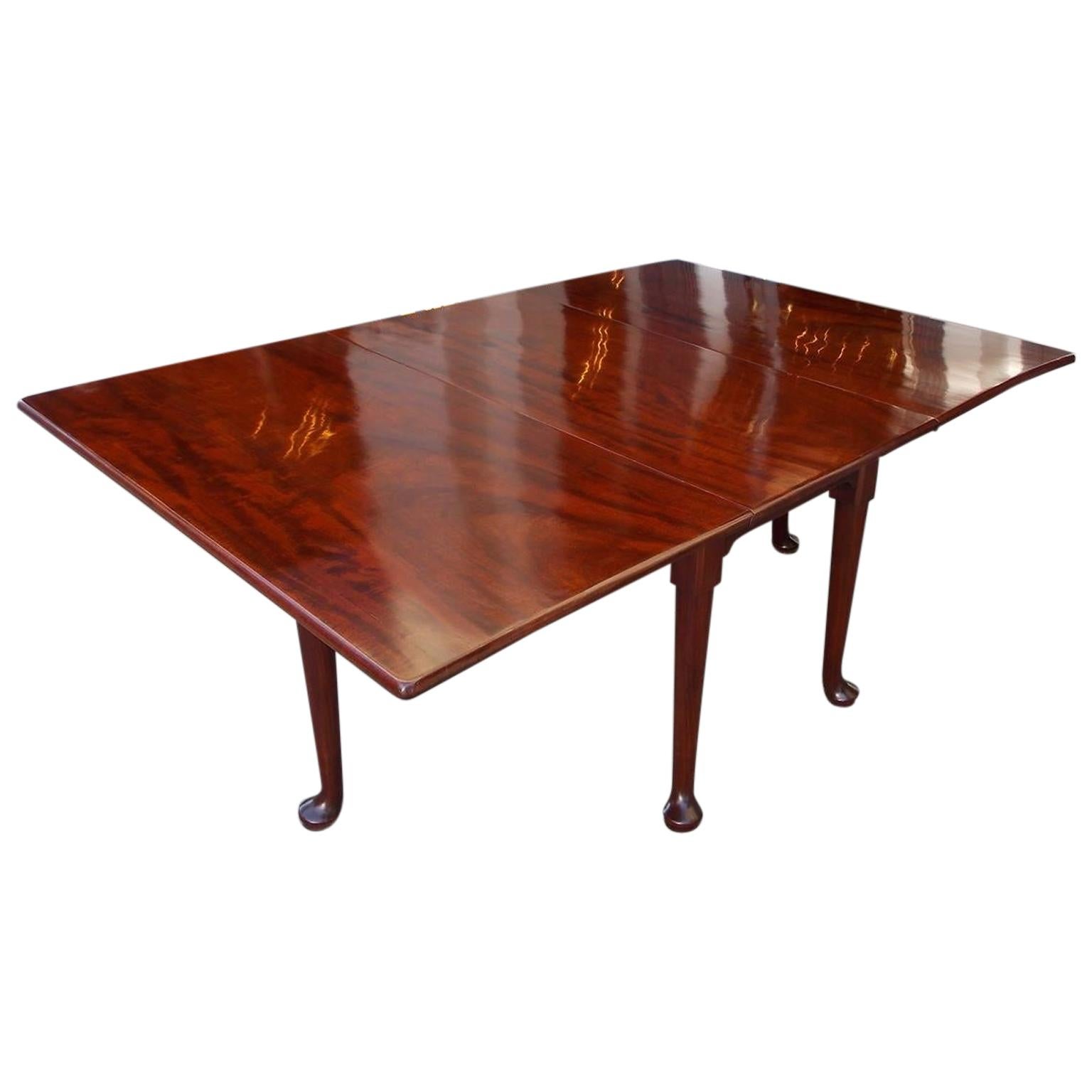 English Queen Anne Cuban Mahogany Drop Leaf Dining Table with Pad Feet, C. 1730