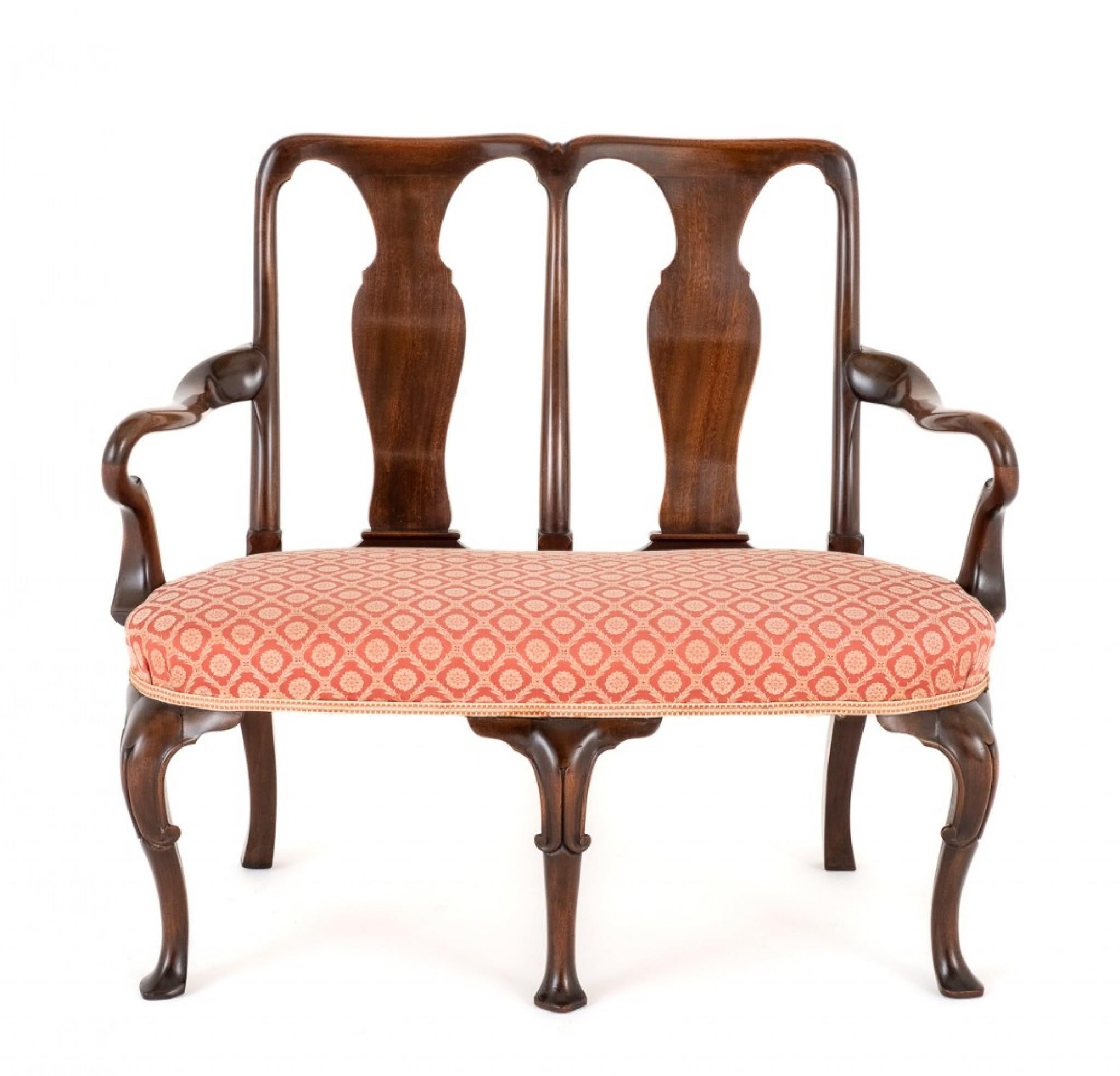 Mahogany Queen Anne Revival Settee.
The back of the settee being of a double chair form with a ventral splat and a shaped cresting rail.
circa 1880
The arms being of a typical queen anne shepherd crook style.
The cabriole front legs having