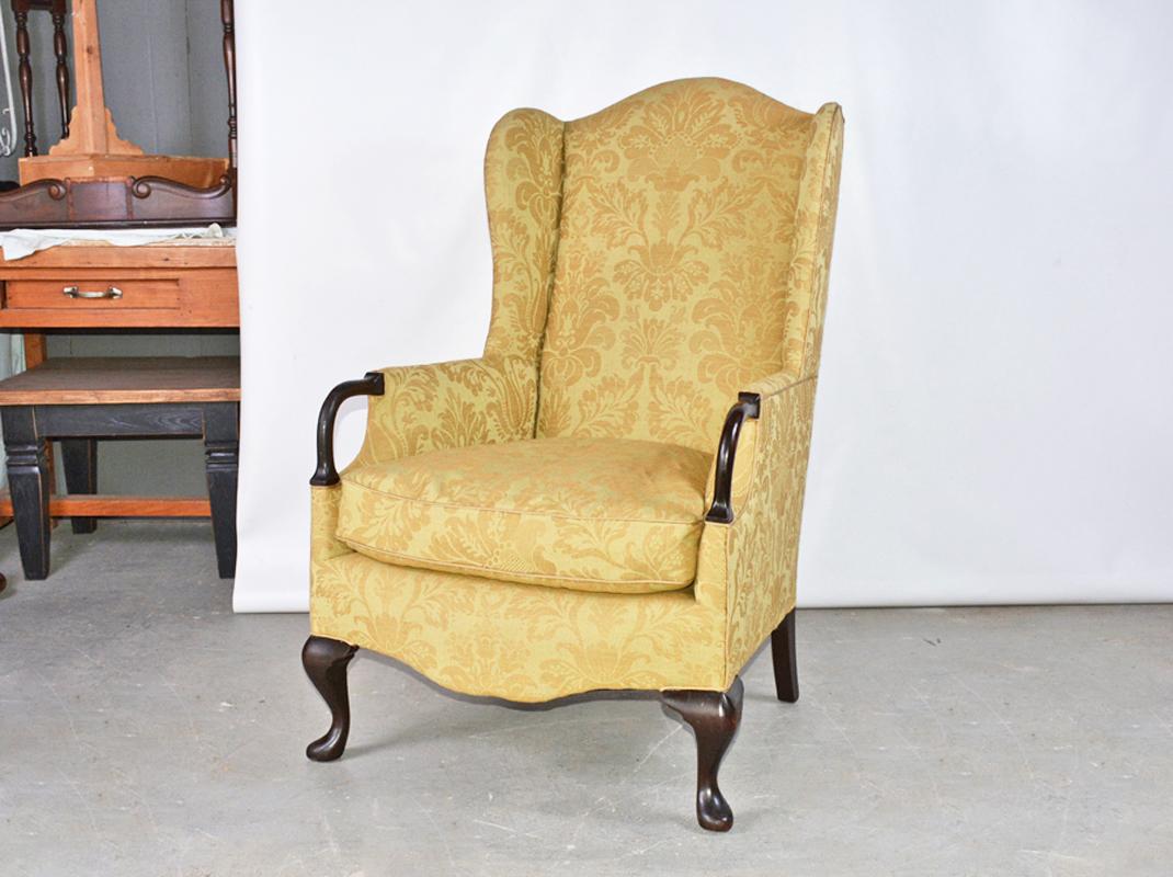 An elegant and well proportioned wing back arm chair with rounded wood arm handles making it easier to get in and out of the chair, terminating in Queen Ann style legs. Victorian.
Arm H = 24.5.

 