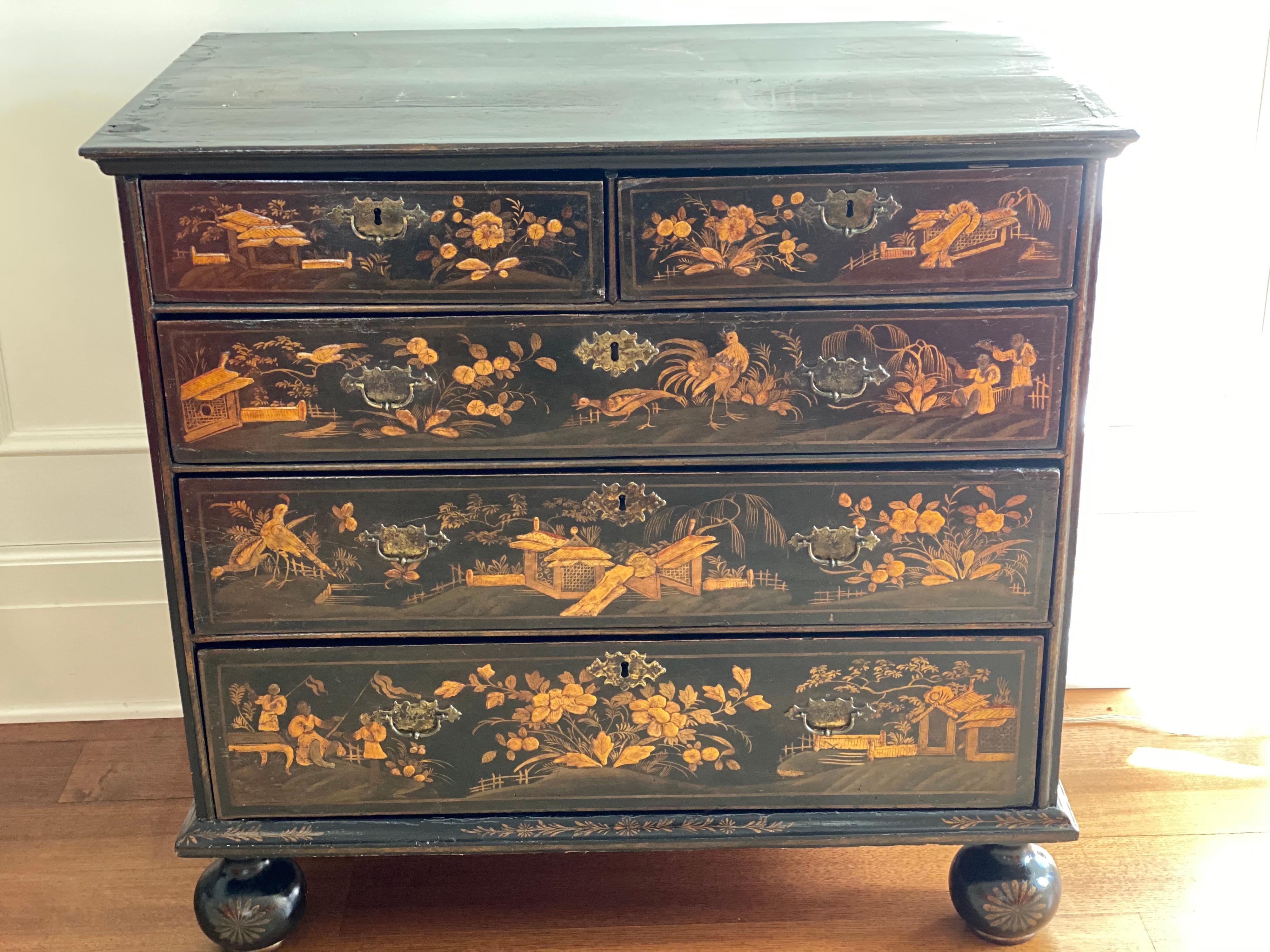 Queen Anne parcel-gilt black-Japanned chest of drawers, circa 1710
The rectangular top above with a crown-molded edge above a conforming case fitted with a pair of short drawers above three graduated long drawers raised on bun feet, the whole