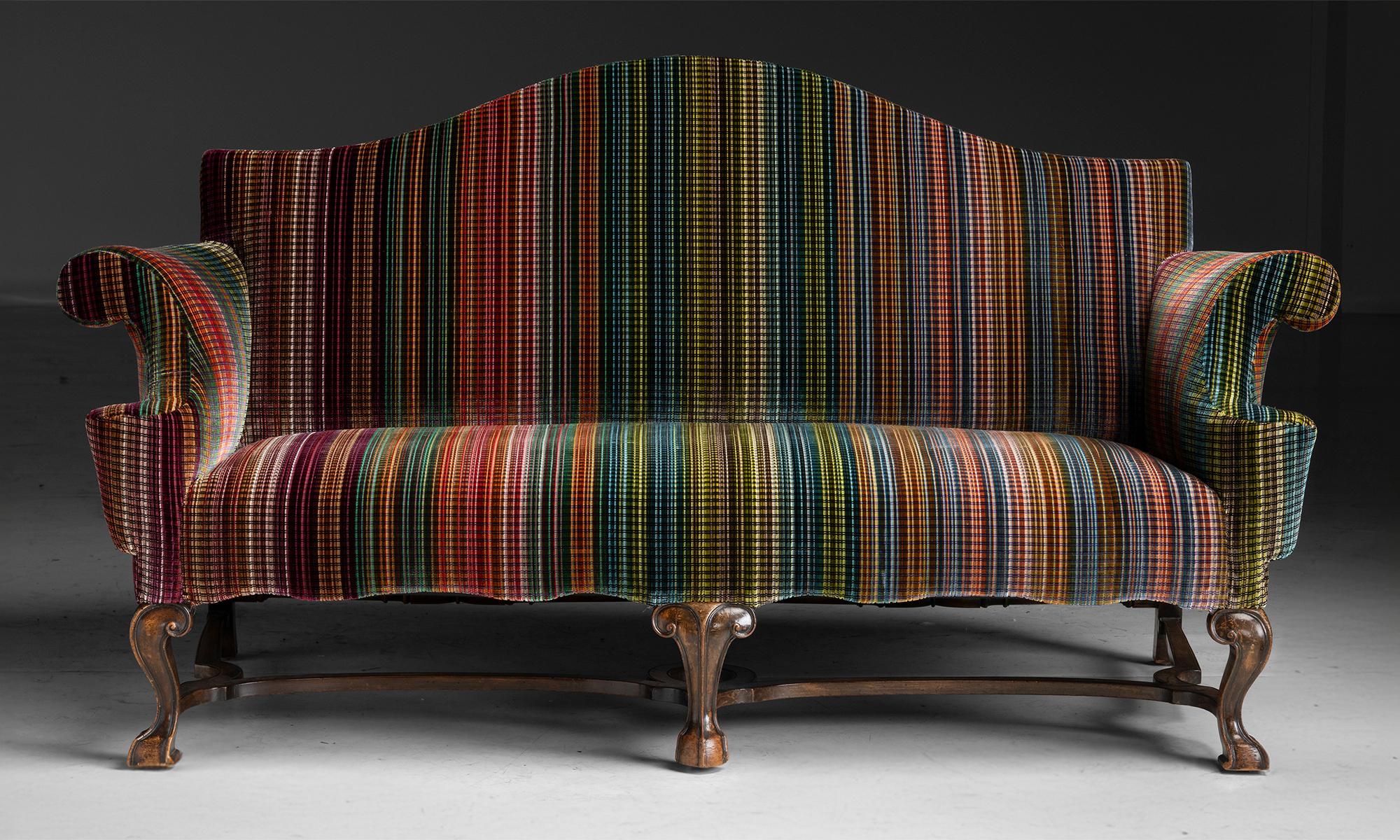 Queen Anne Sofa in Pierre Frey Velvet
England circa 1910
Walnut legs, stretcher marked Charles Tozer, London. Newly upholstered in striped velvet by Pierre Frey.
72”L x 31”d x 38”h x 18”seat