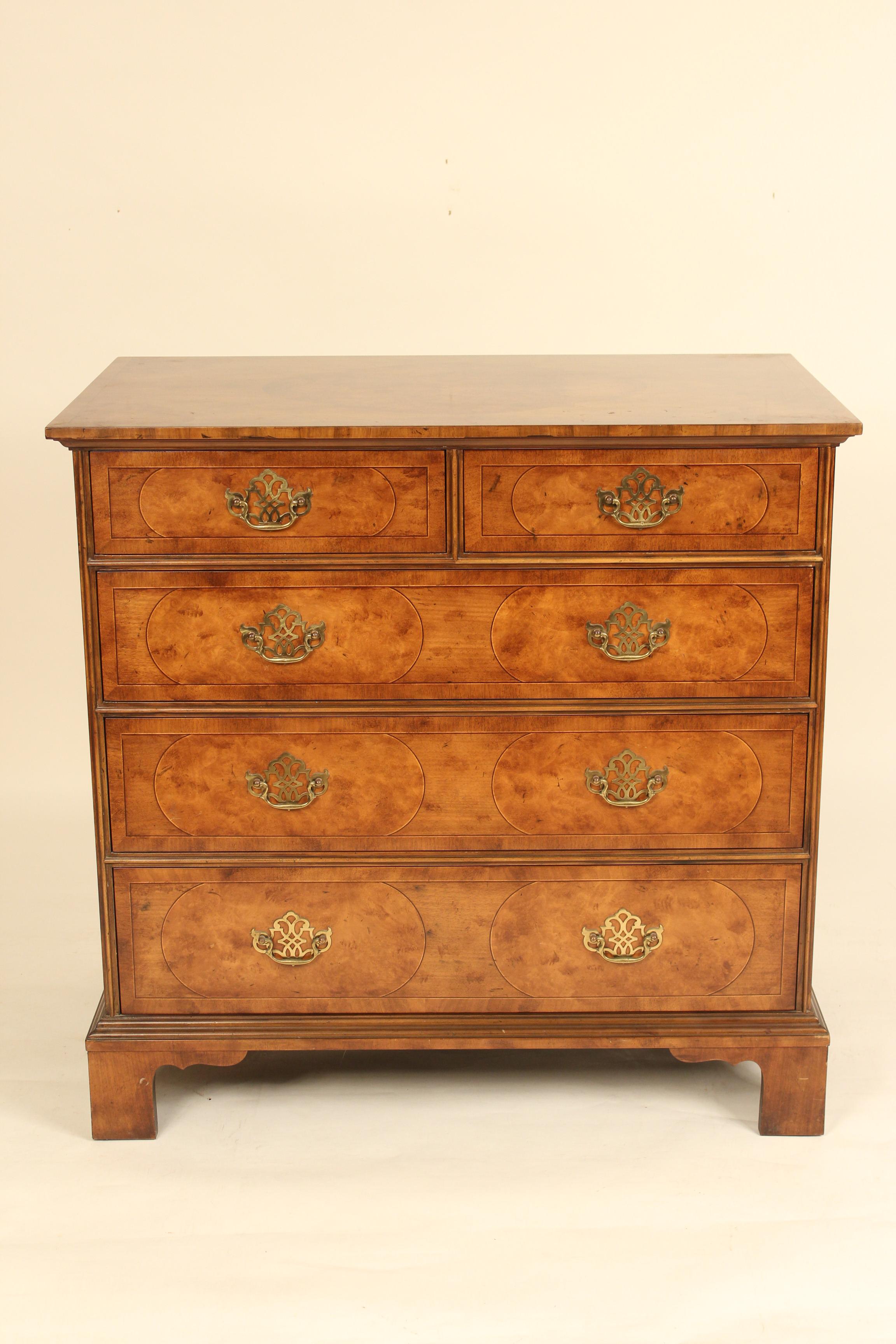 Queen Anne style burl walnut and walnut chest of drawers, made by Baker Furniture, circa 1990. A plaque in the upper right drawer indicates that this is part of the 