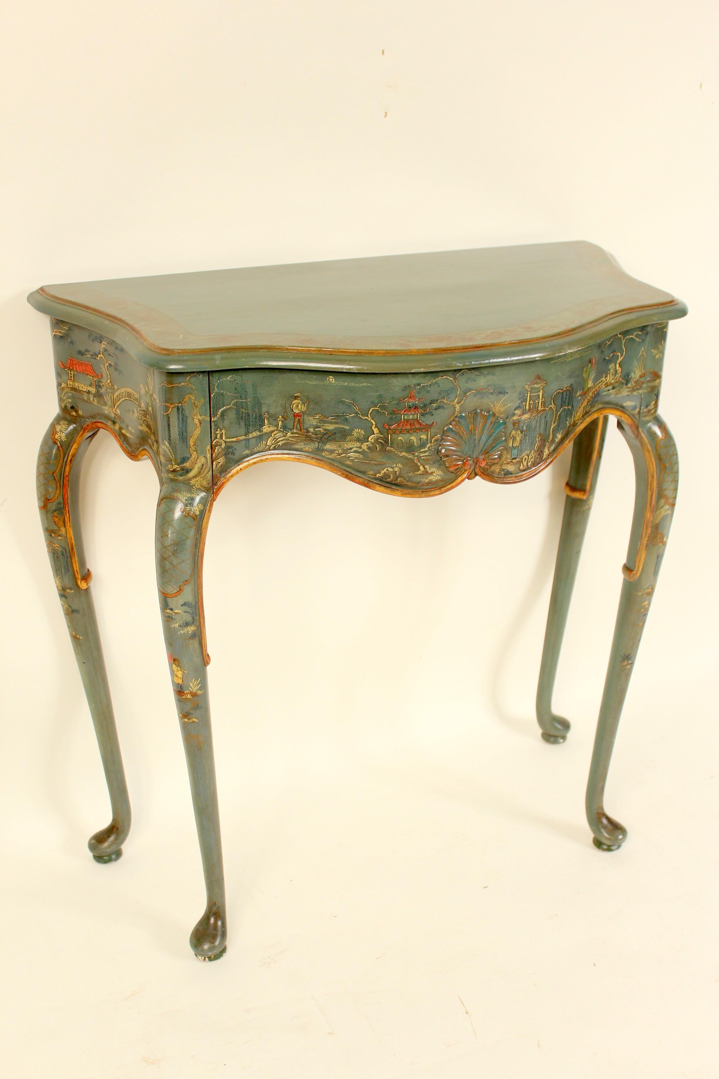 Queen Anne style chinoiserie decorated console and mirror, circa mid-20th century. Handmade dovetails on console drawer, nice quality raised chinoiserie decoration. Dimensions of console, height 34.25