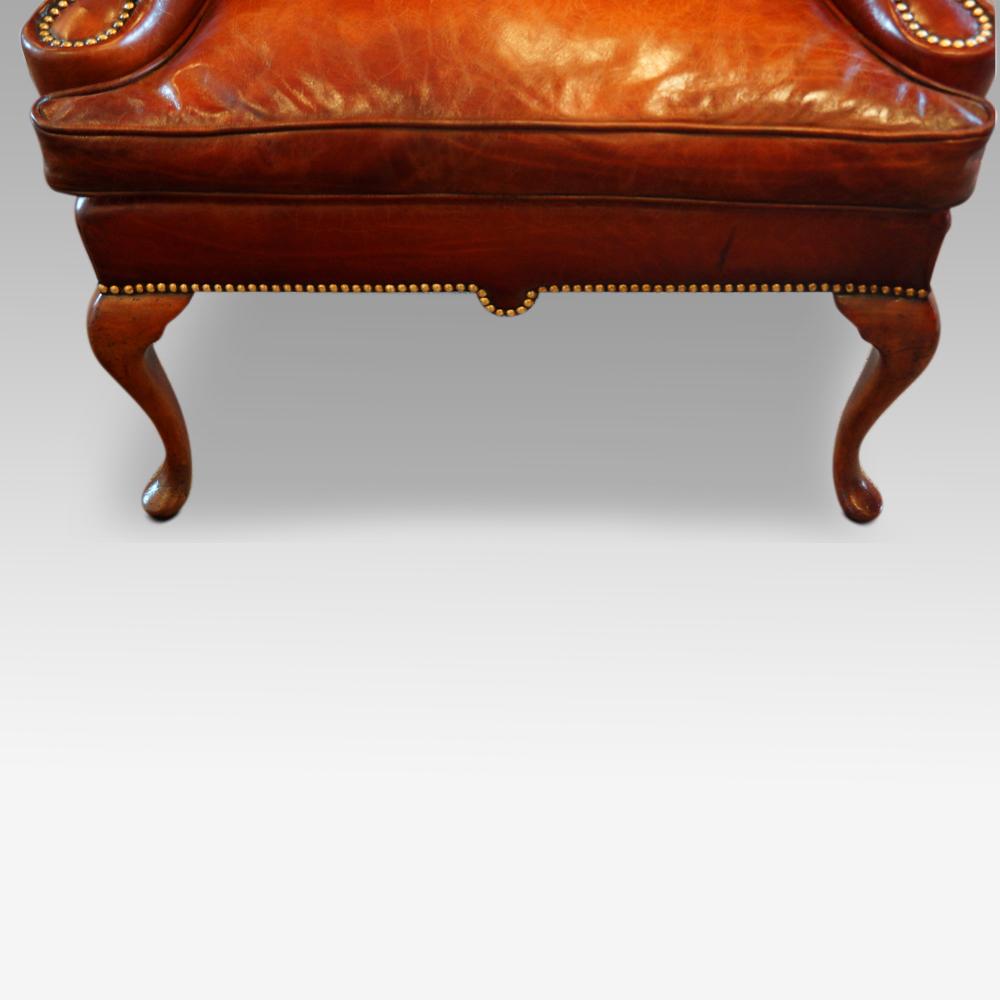 Queen Anne style high back leather wingchair
This Queen Anne style high-back leather wingchair was made, circa 1920.
This wingchair has the elegant high back, and so is striking in its overall look.
The chair stands on plain cabriole legs with