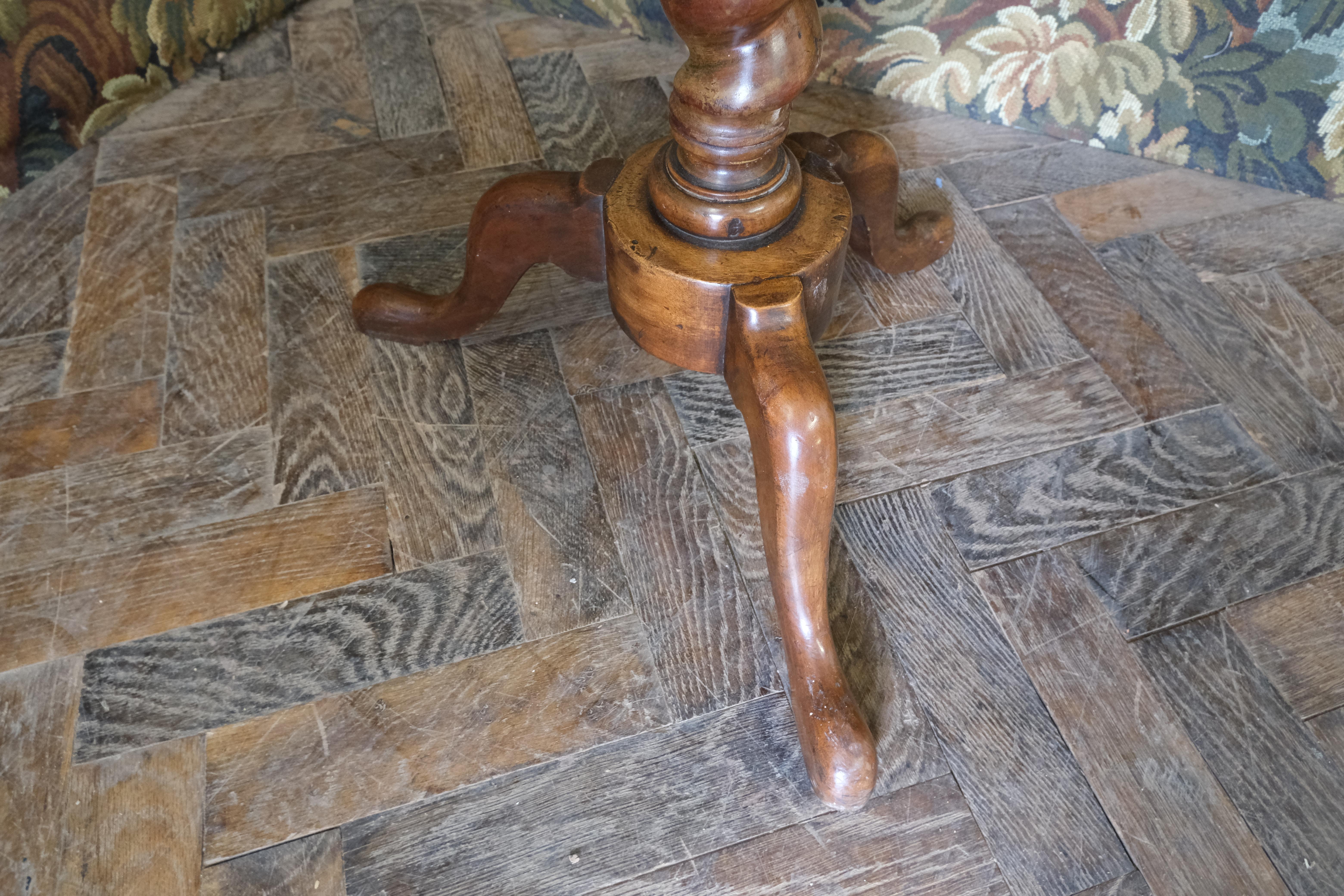 Hutton-Clarke Antiques is delighted to offer a splendid 19th-century Queen Anne walnut table reproduction, a stunning addition to any discerning home. This exquisite piece features an oyster-veneered laburnum top, beautifully contrasted by a solid